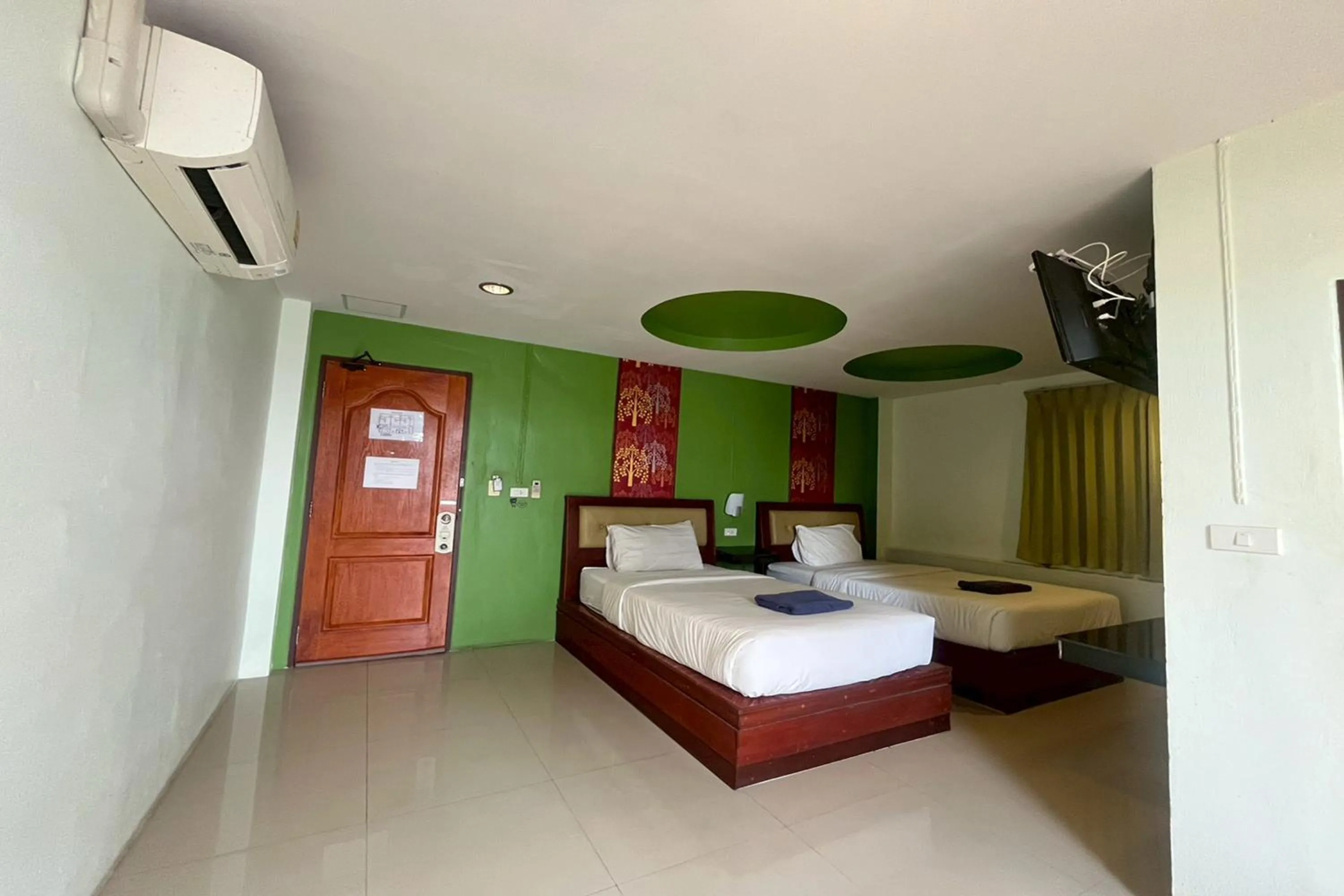 Bed in Krabi Orchid Hometel