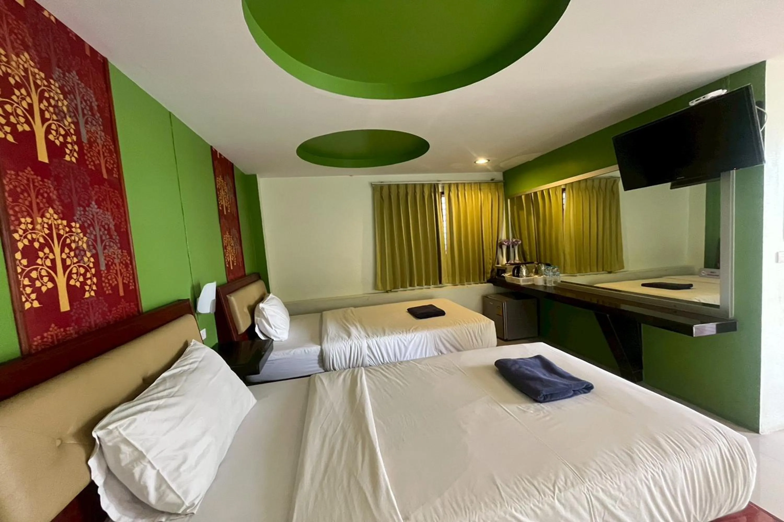 Bed in Krabi Orchid Hometel