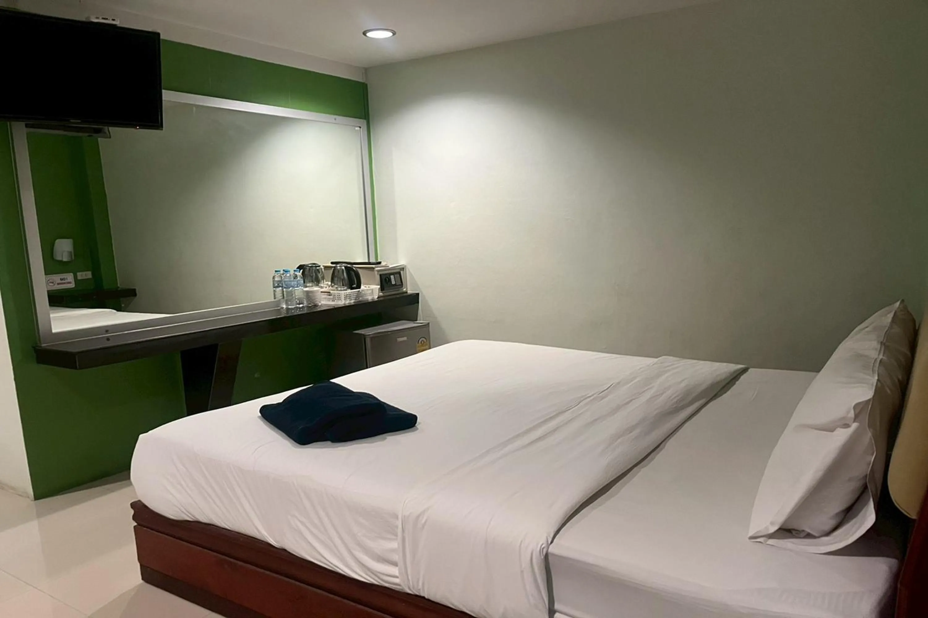 Bed in Krabi Orchid Hometel