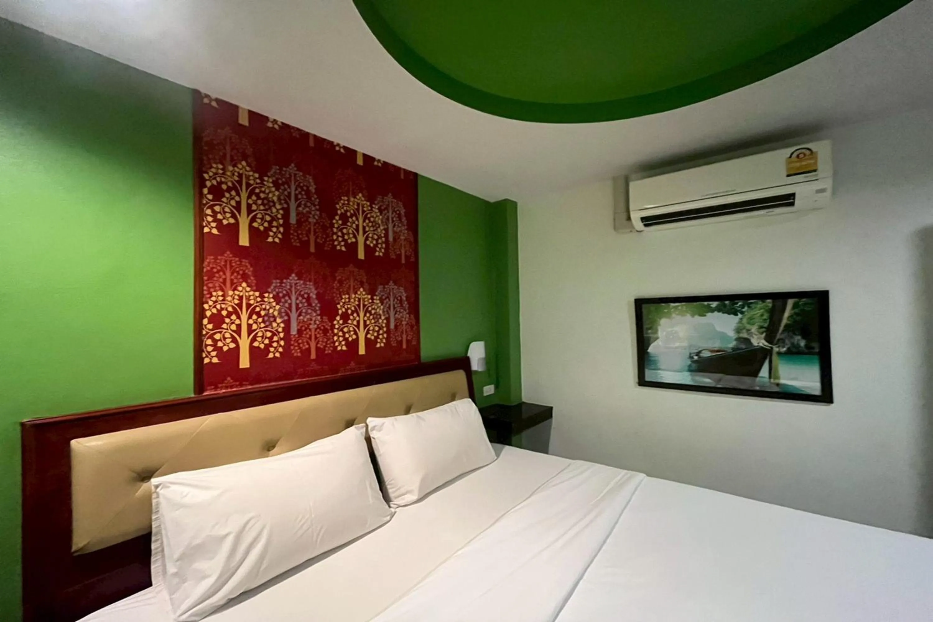 Bed in Krabi Orchid Hometel