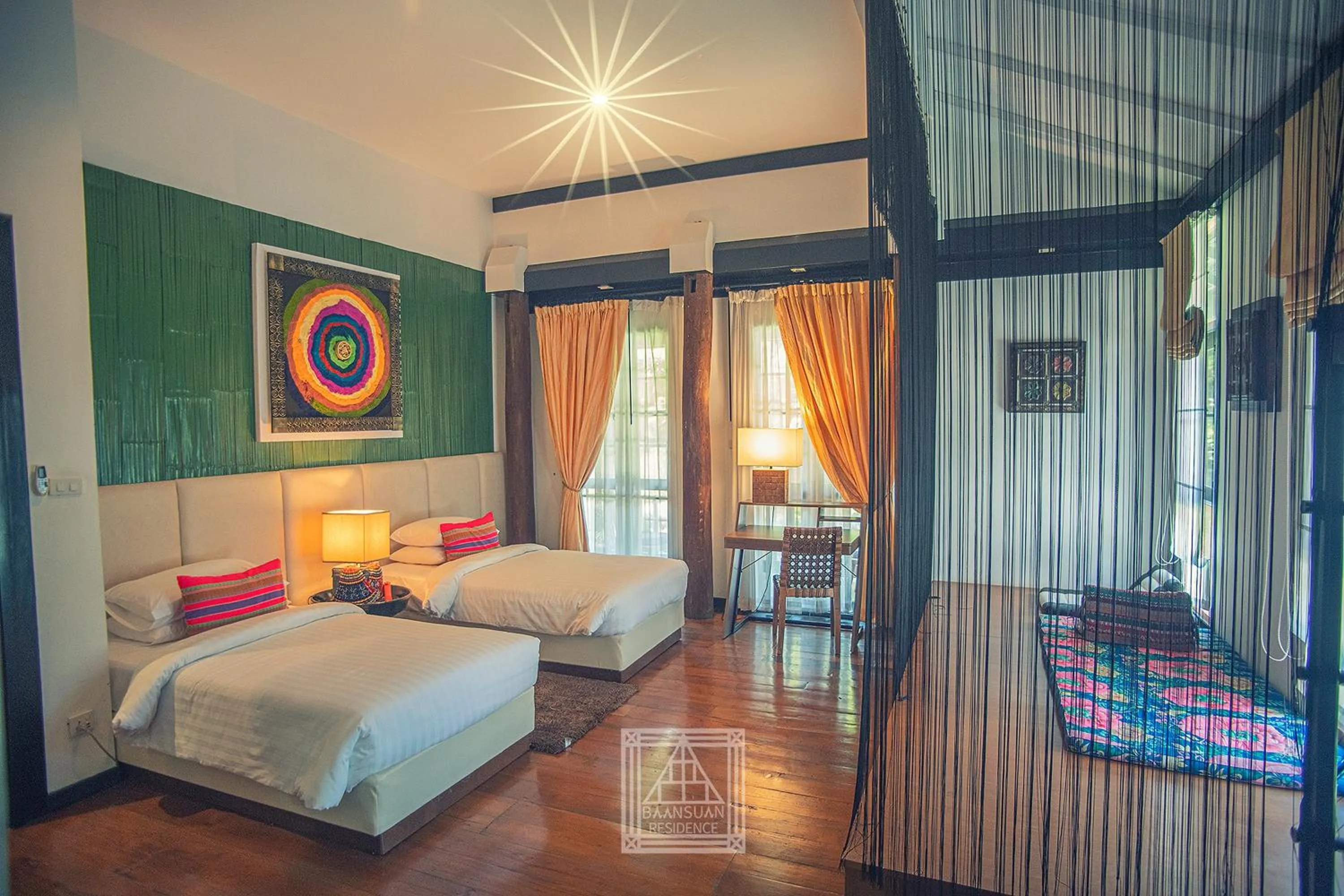 Bed in Baan Suan Residence เฮือนพักบ้านสวน