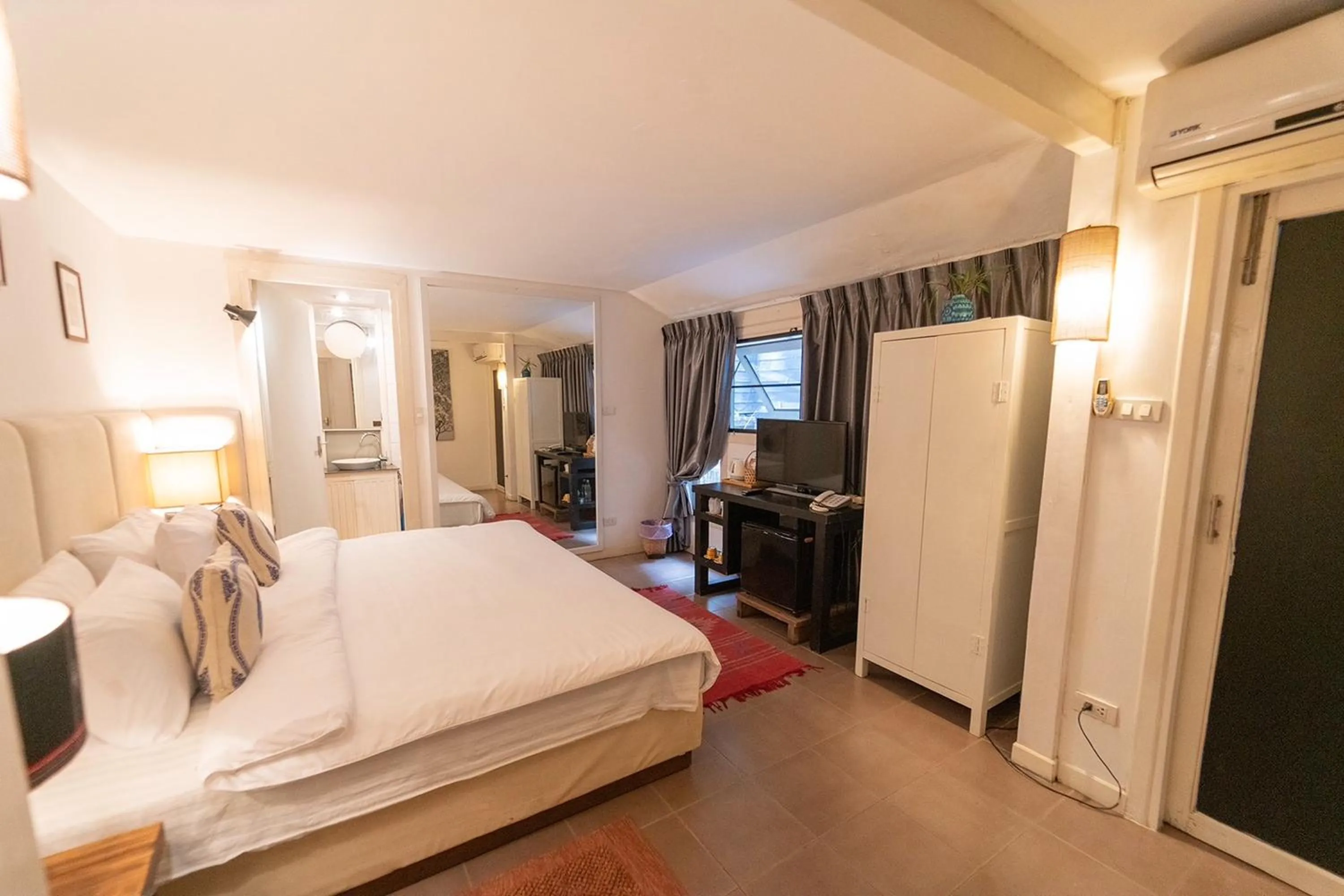 Bed in Baan Suan Residence เฮือนพักบ้านสวน