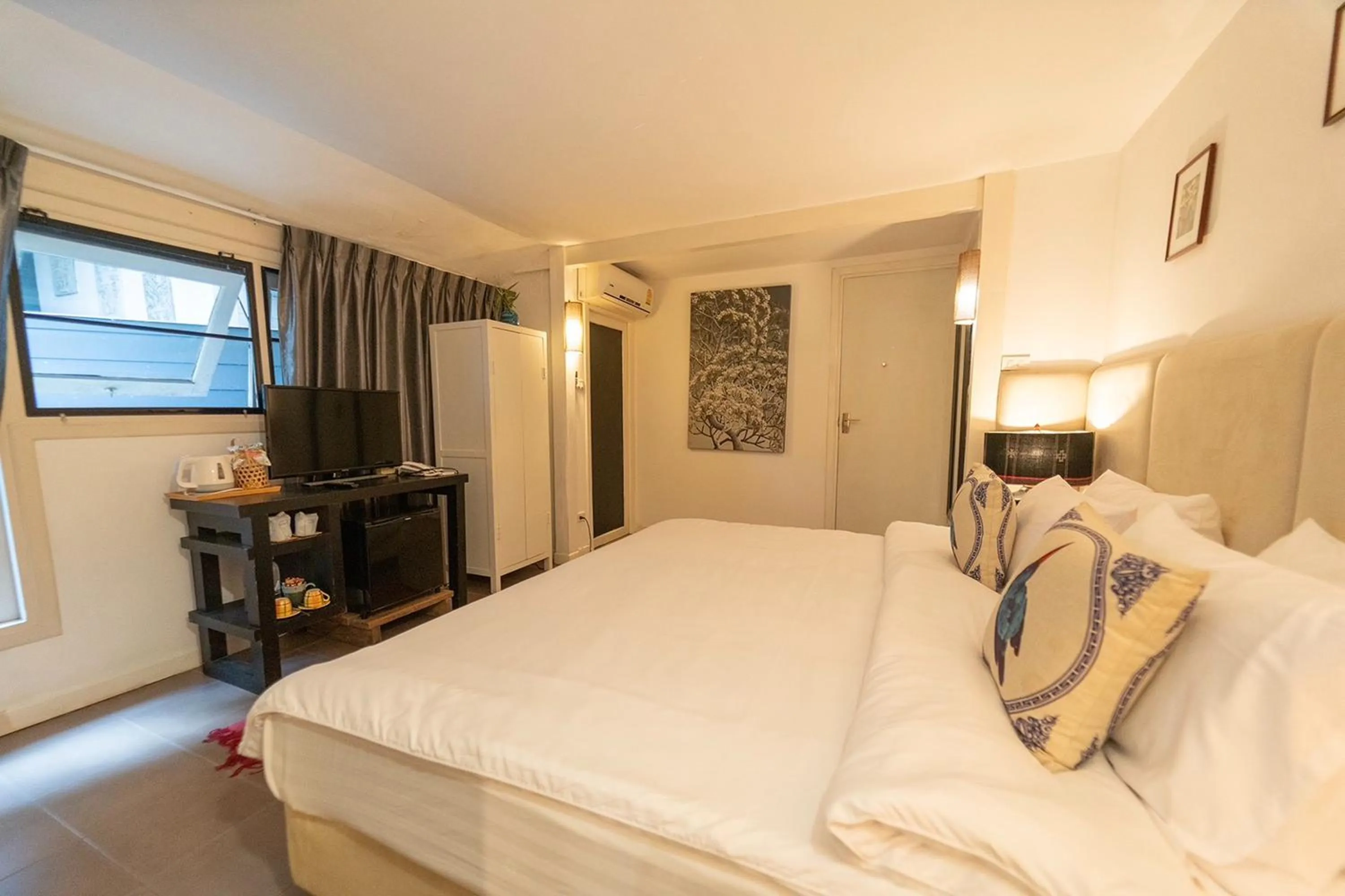 Bed in Baan Suan Residence เฮือนพักบ้านสวน