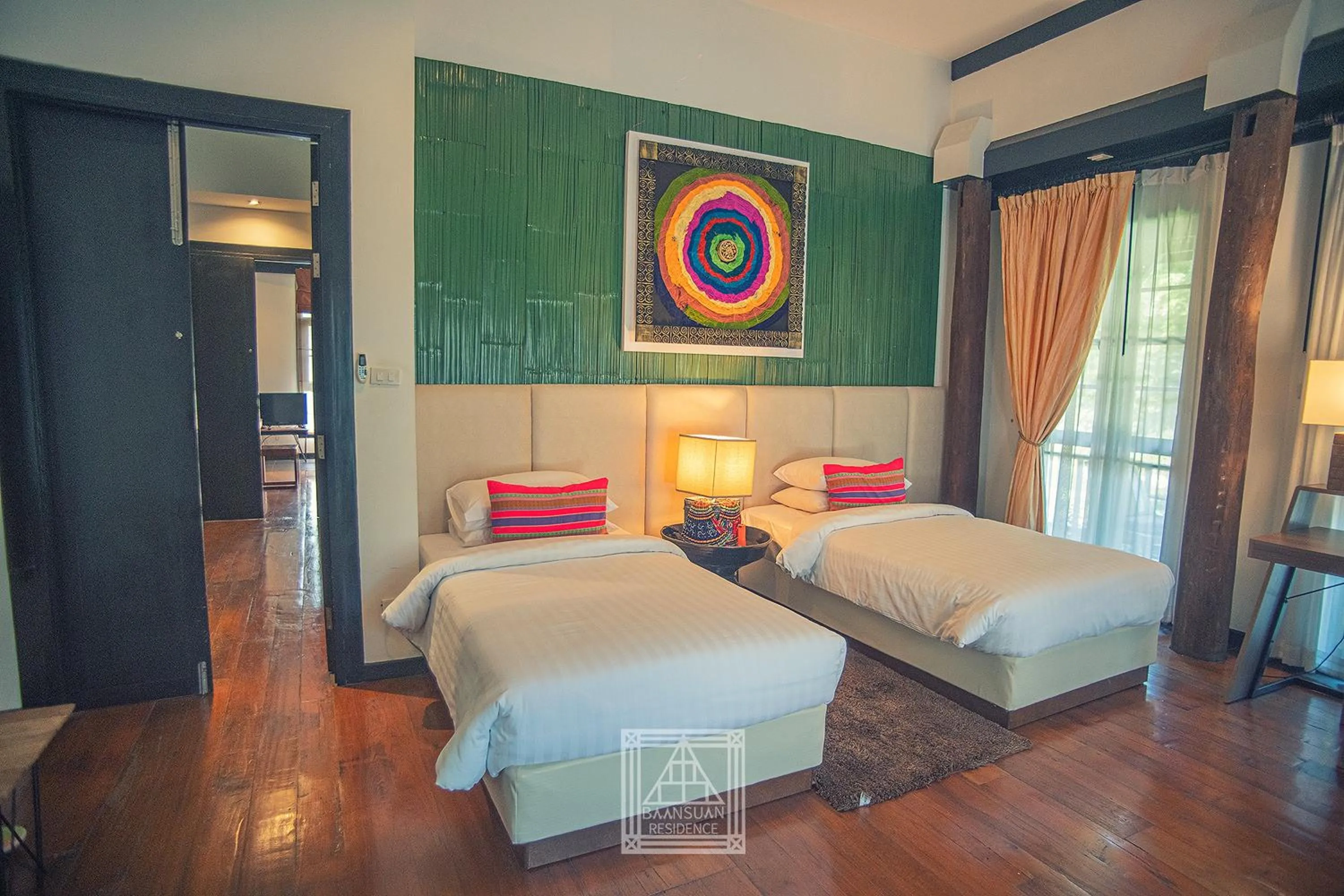 Bed in Baan Suan Residence เฮือนพักบ้านสวน