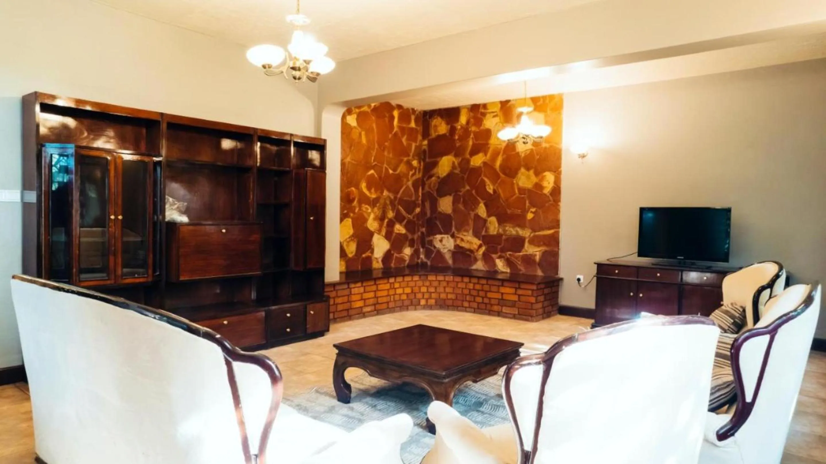 Communal lounge/ TV room in Olivia Guesthouse