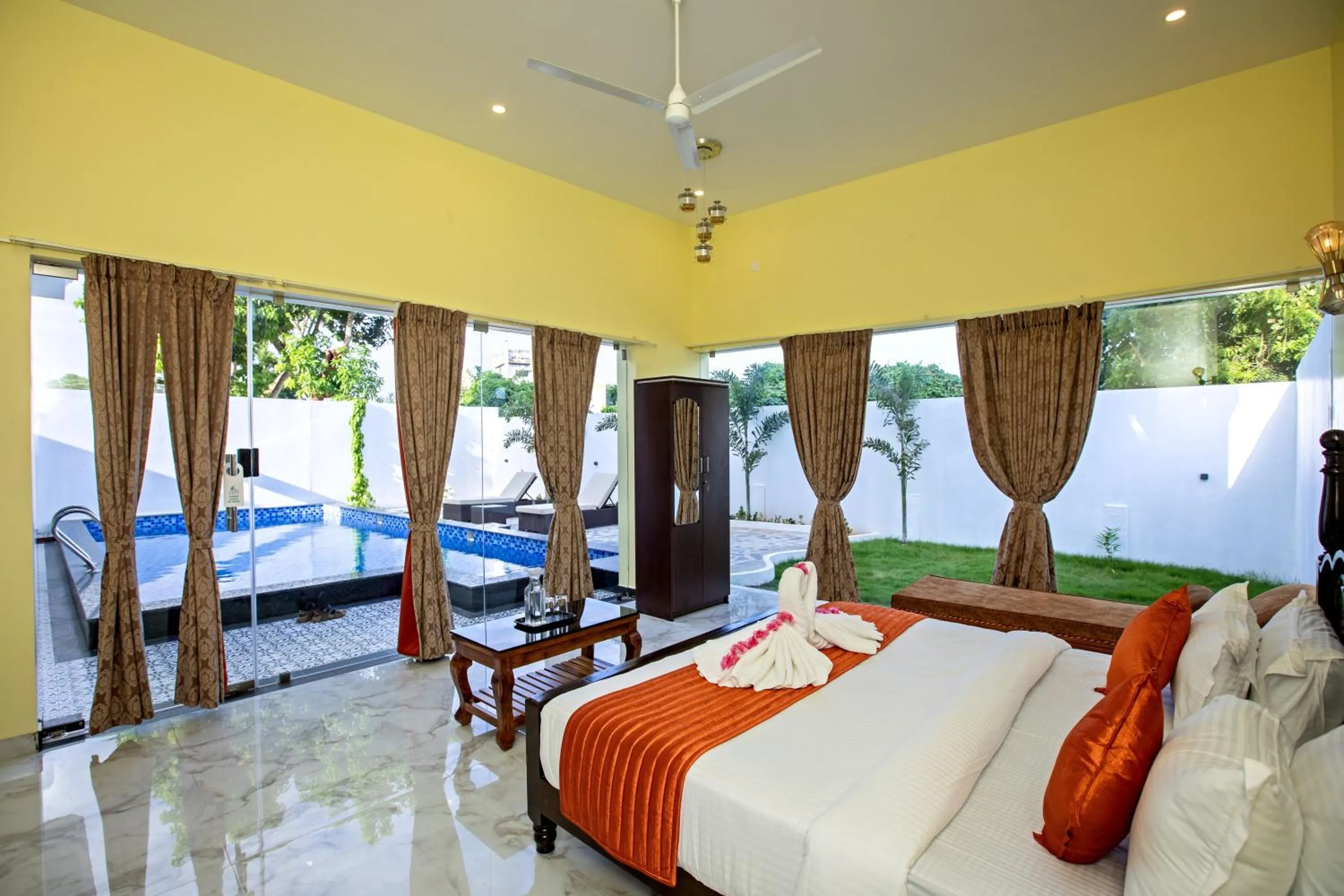 Photo of the whole room, Bed in T Resort with Swimming Pool