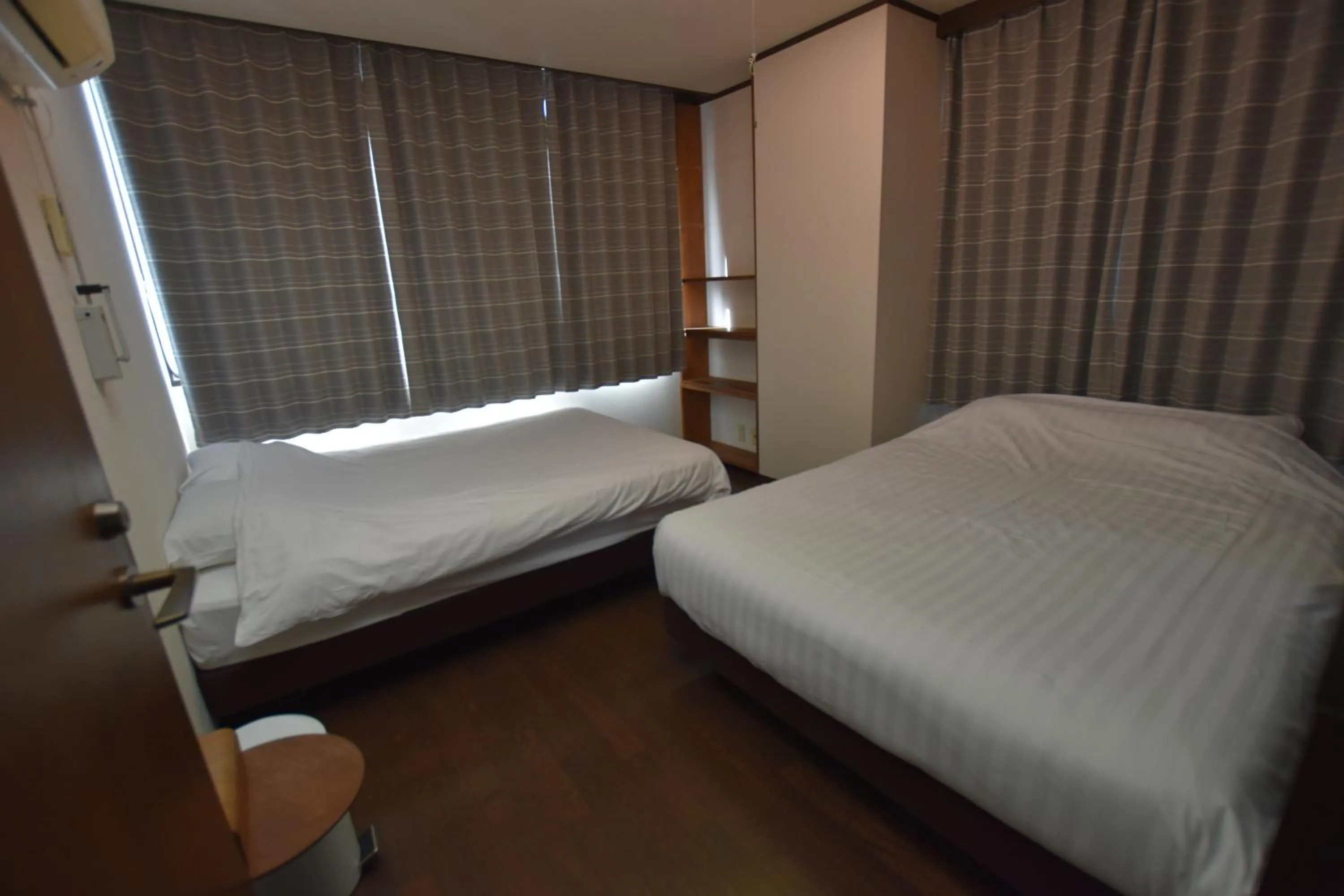 Bed in Randor Residence Tokyo Grand