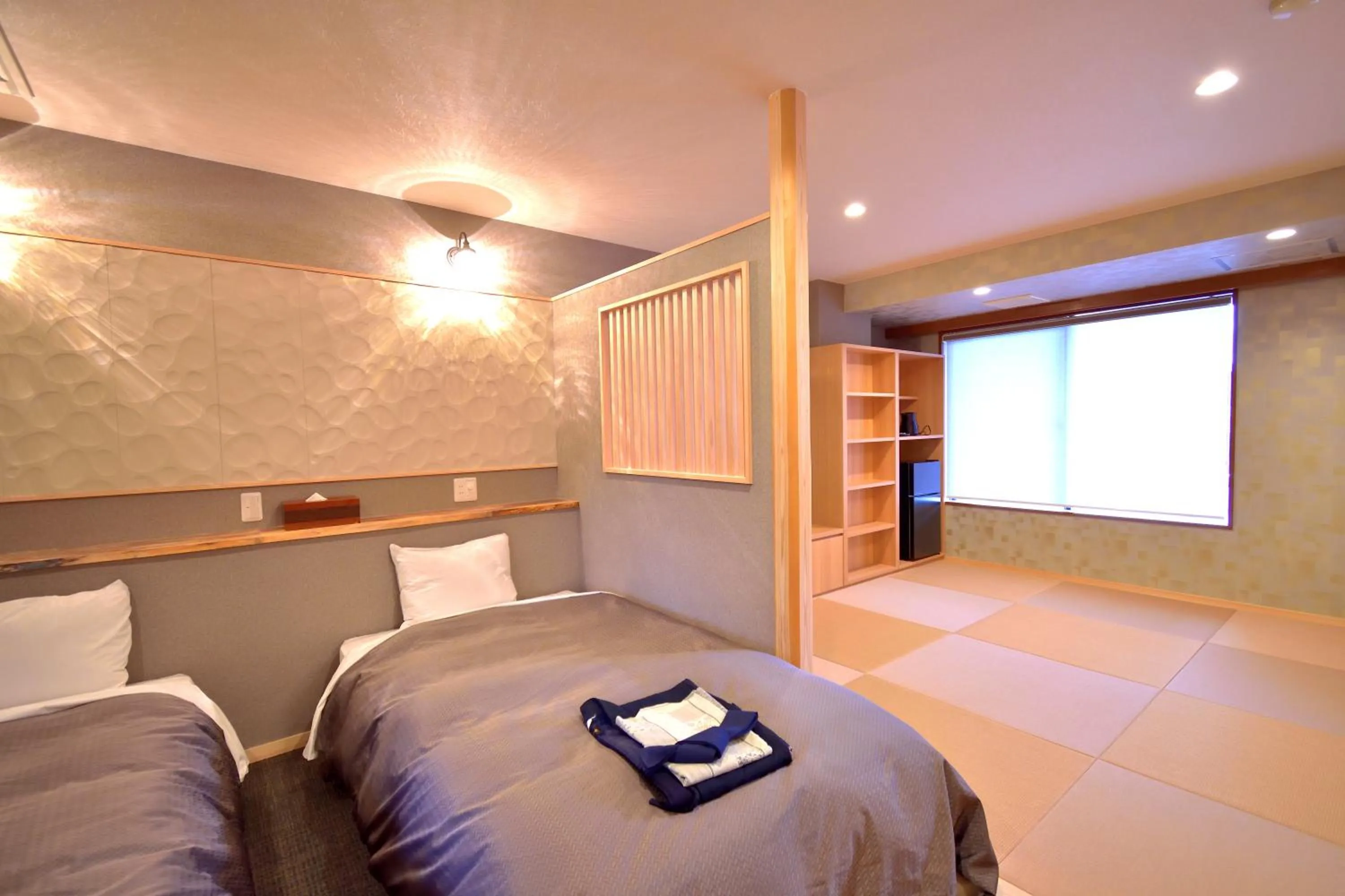 Bed in こんぴら温泉 貸切湯の宿 ことね