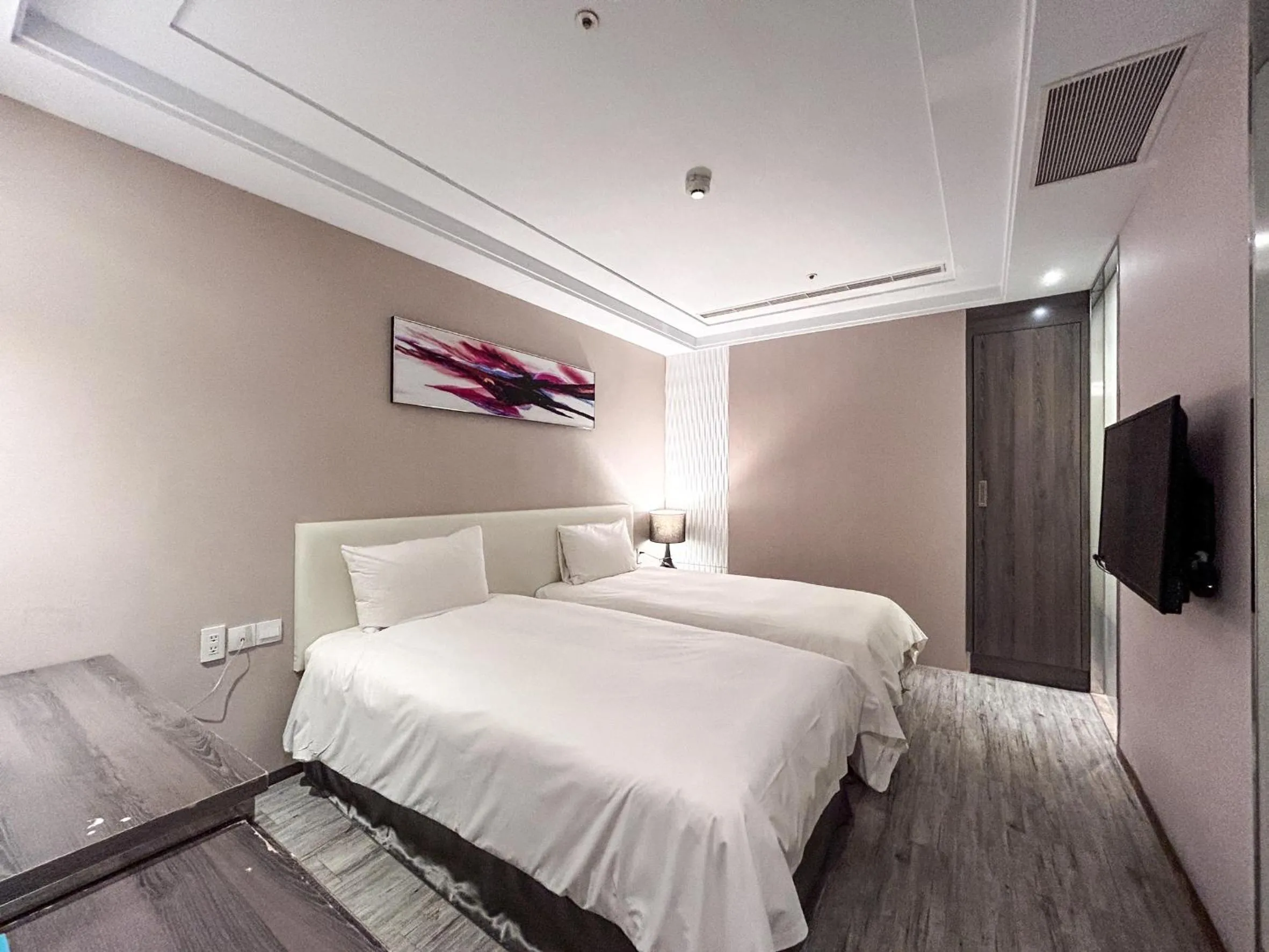 Bed in Royal Fine Hotel