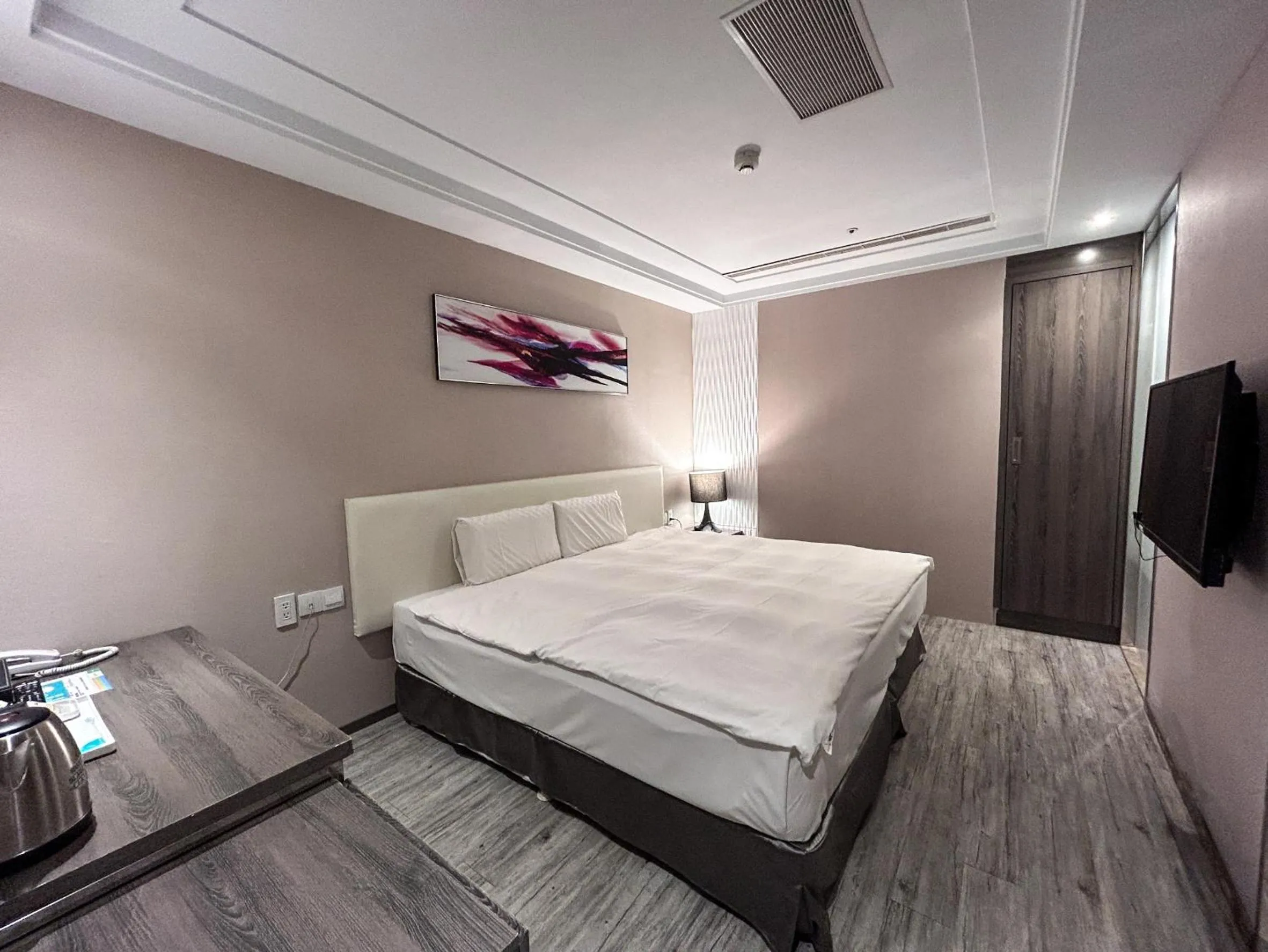 Bed in Royal Fine Hotel