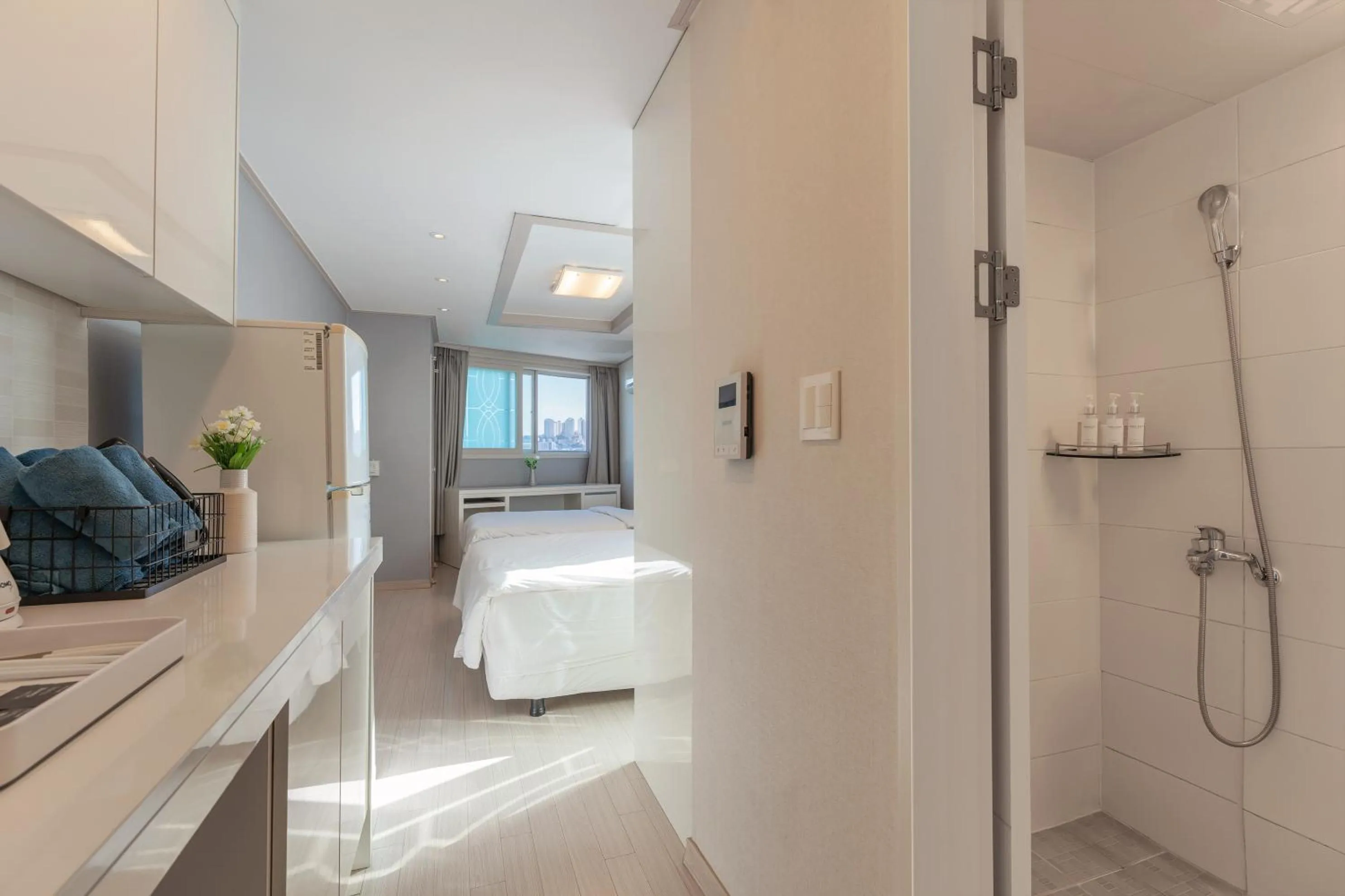 Bed in Staywell Hotel