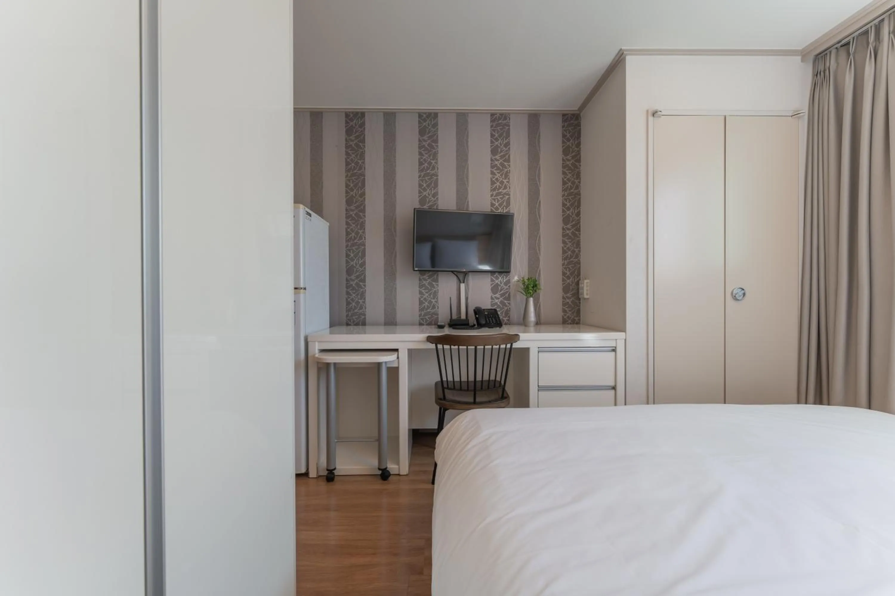 Bed in Staywell Hotel