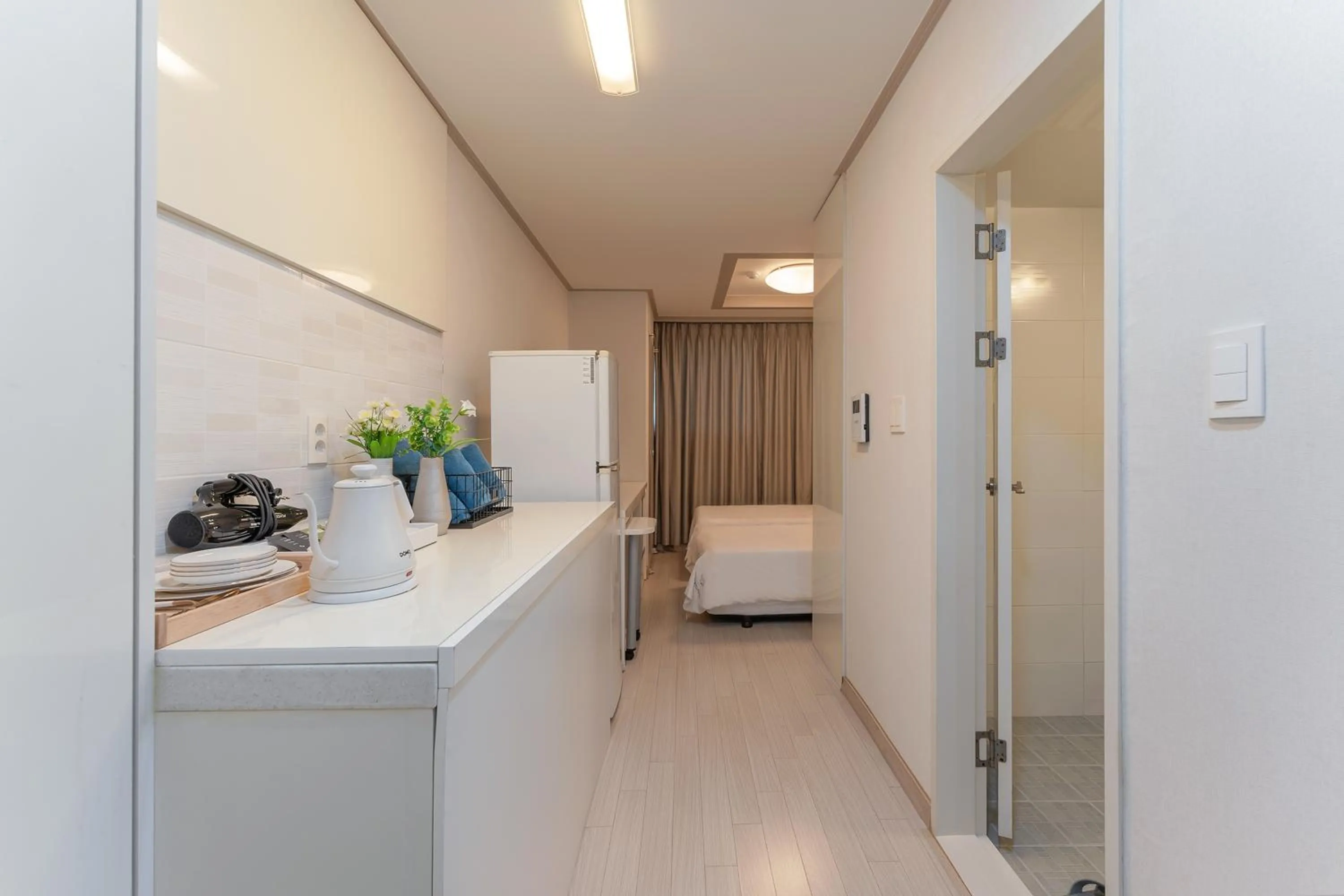 Bed in Staywell Hotel