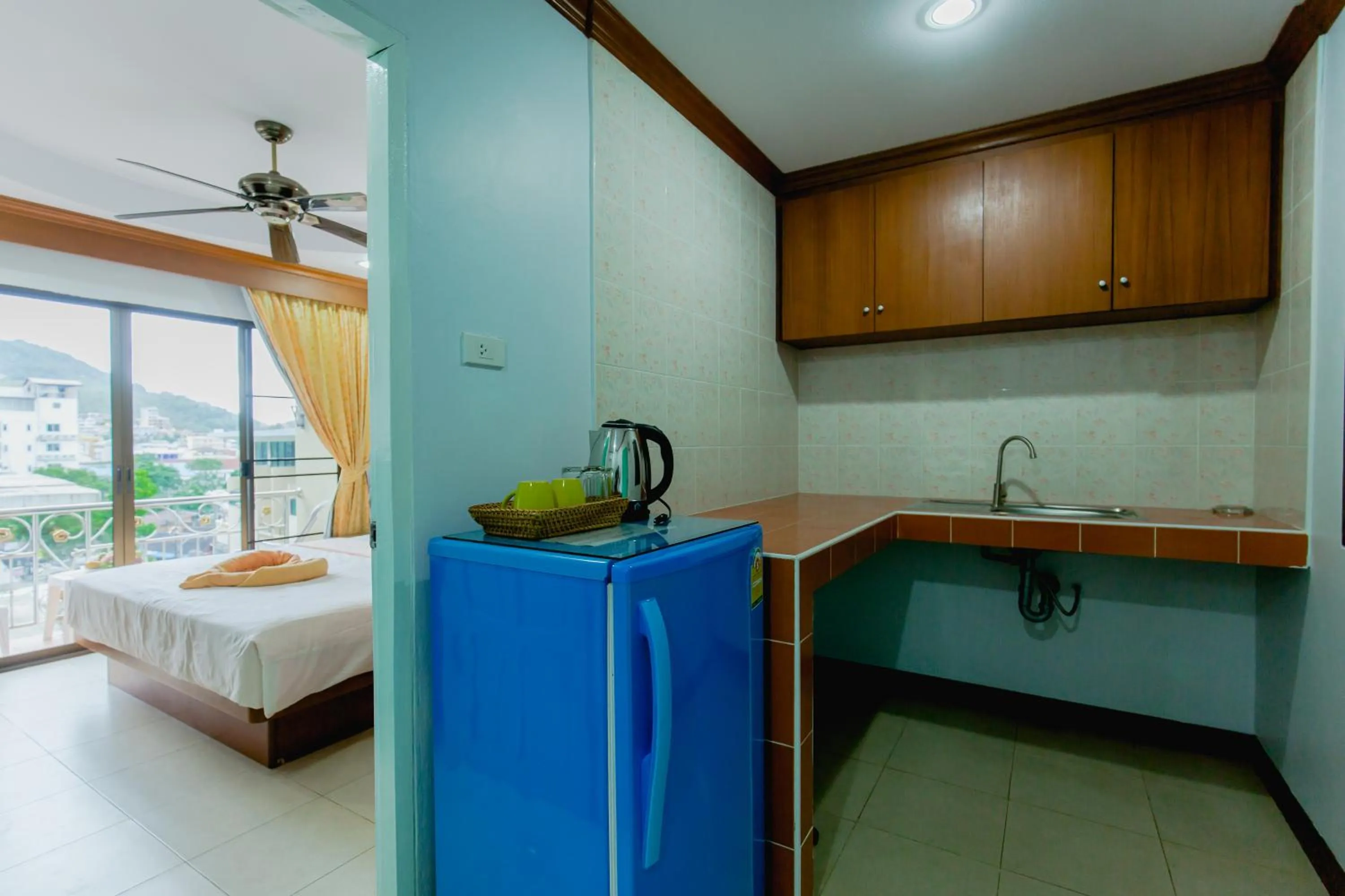 Kitchen or kitchenette, Bed in RK Guesthouse