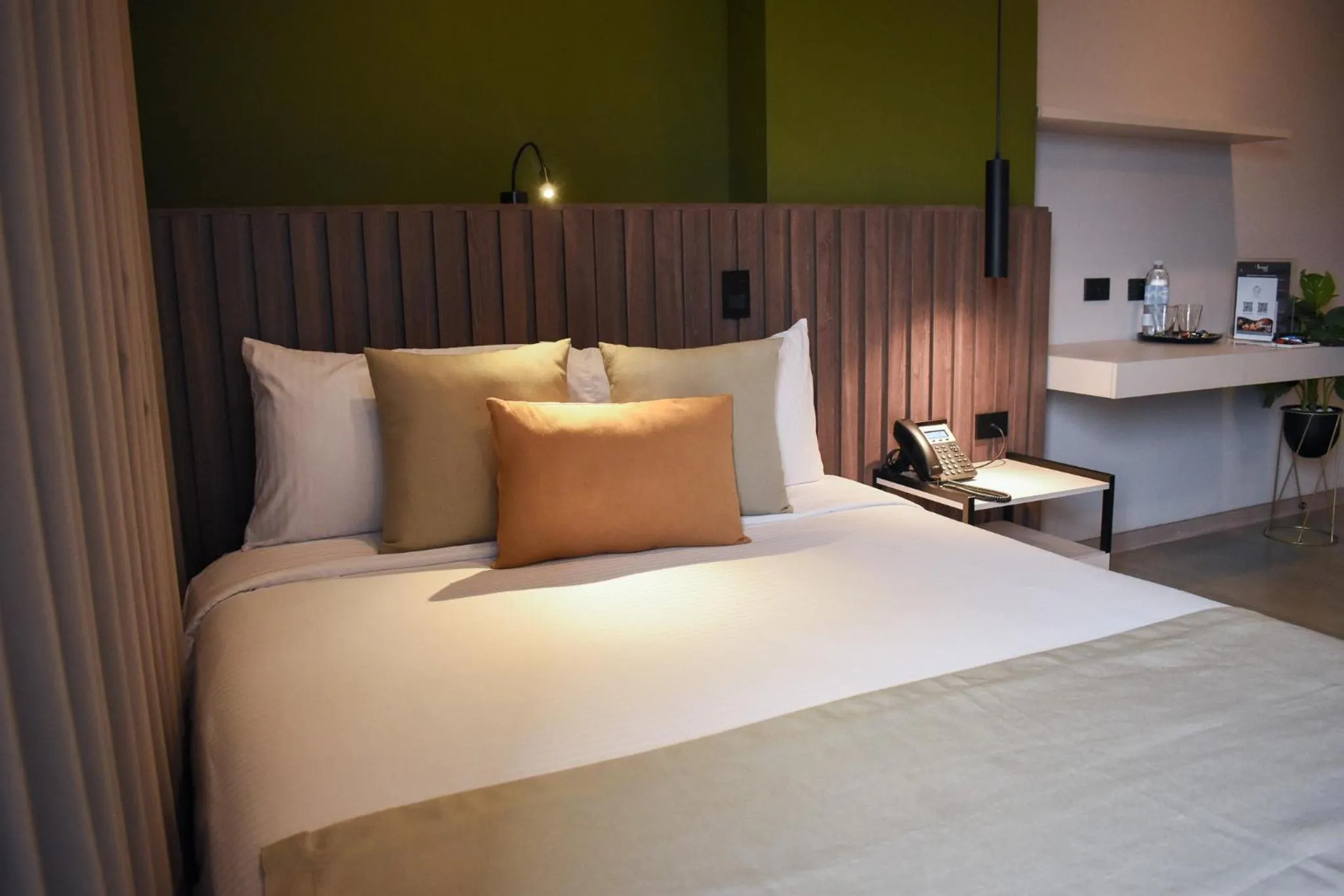 Bed in Hotel Living 35 Suites by Growing Group