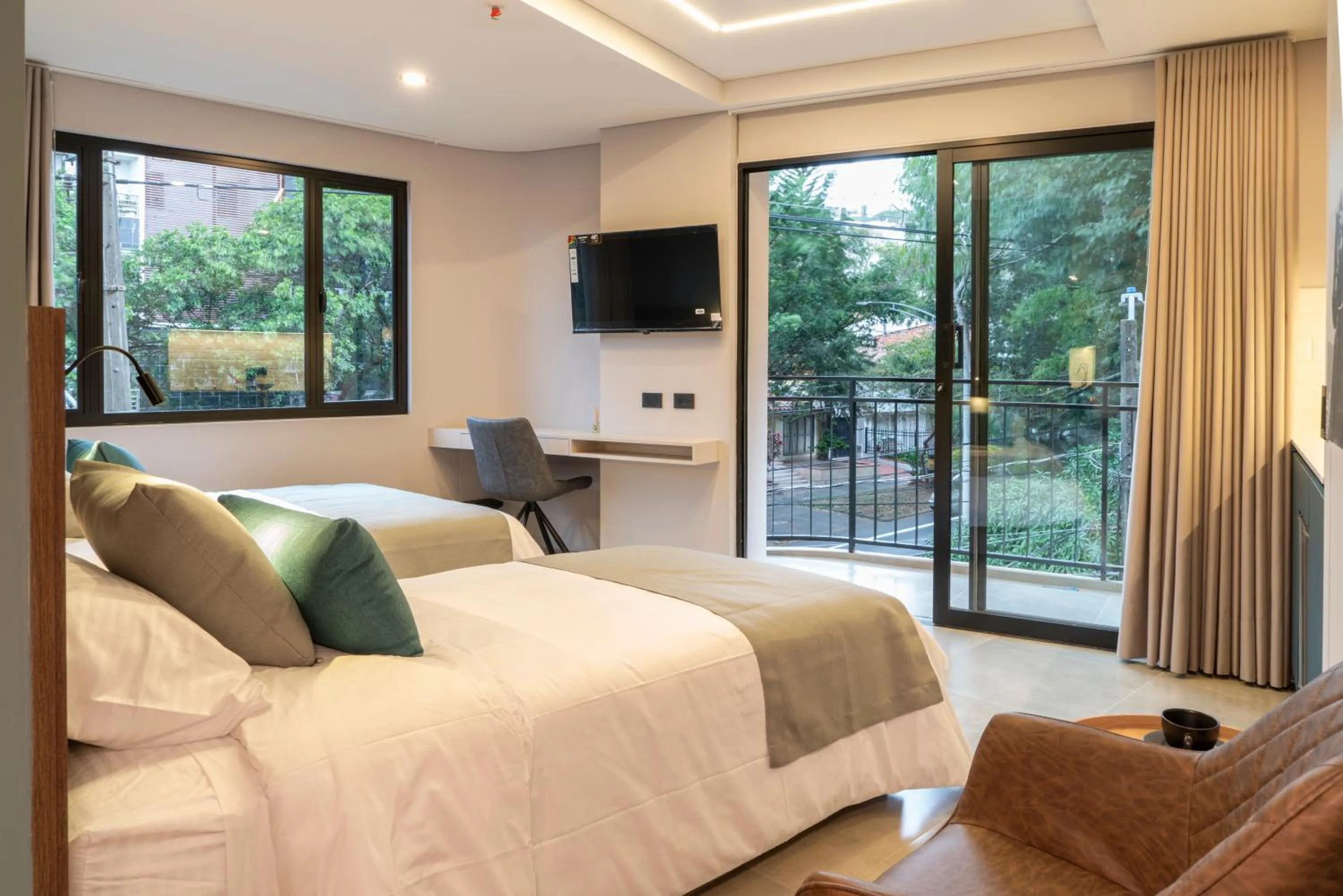 TV and multimedia, Bed in Hotel Living 35 Suites