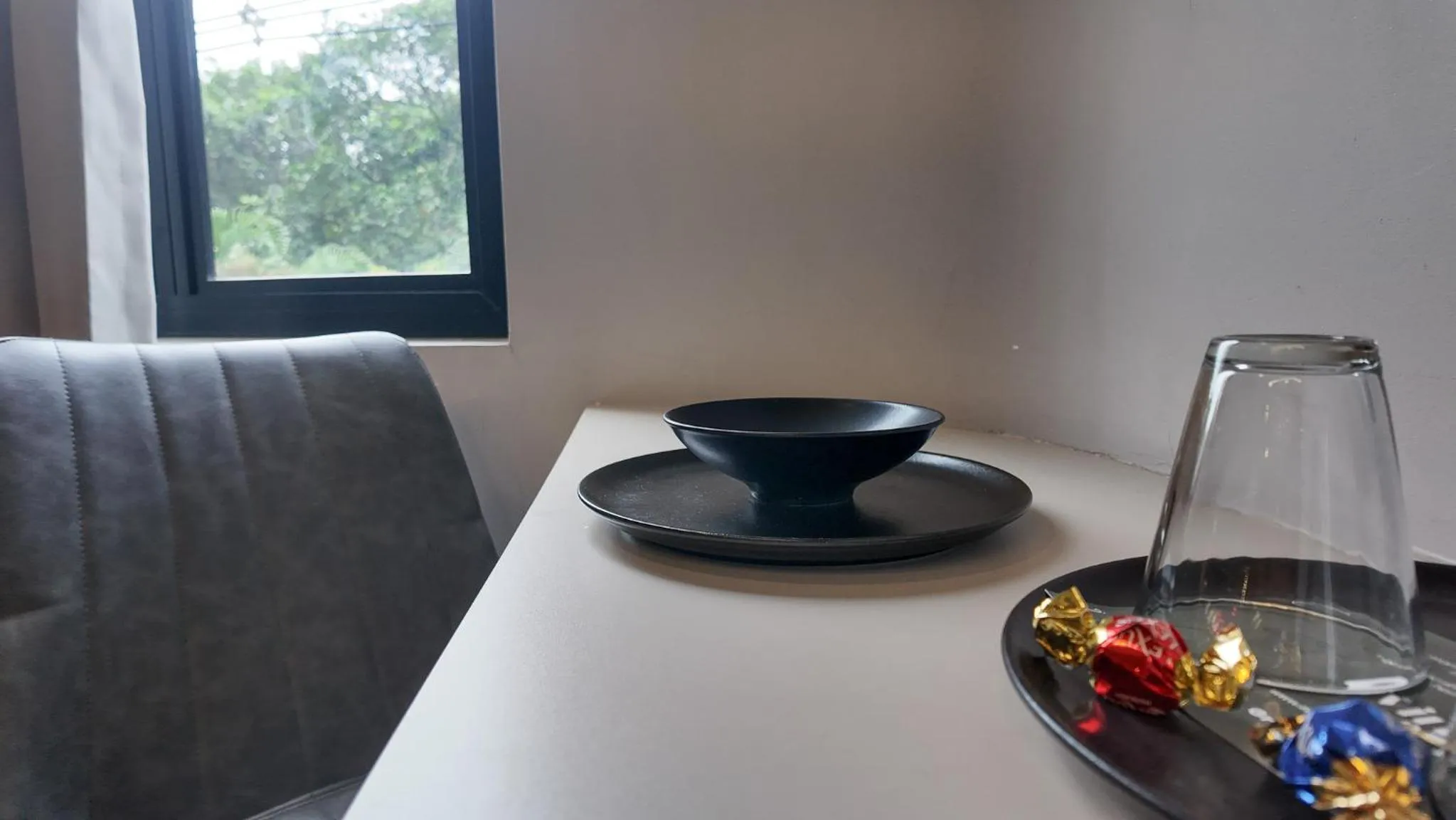 Seating area in Hotel Living 35 Suites by Growing Group