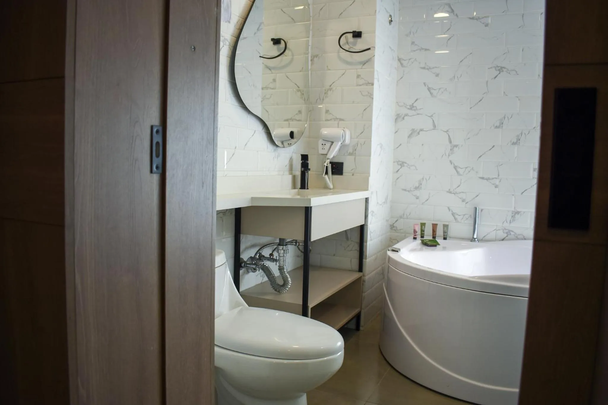 Toilet in Hotel Living 35 Suites by Growing Group
