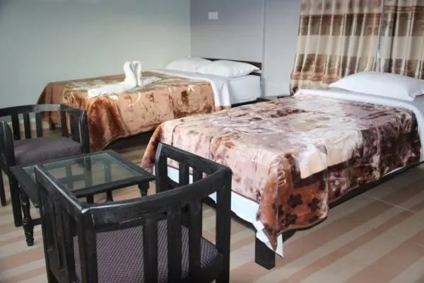 Bed in Harvest Moon Guest House