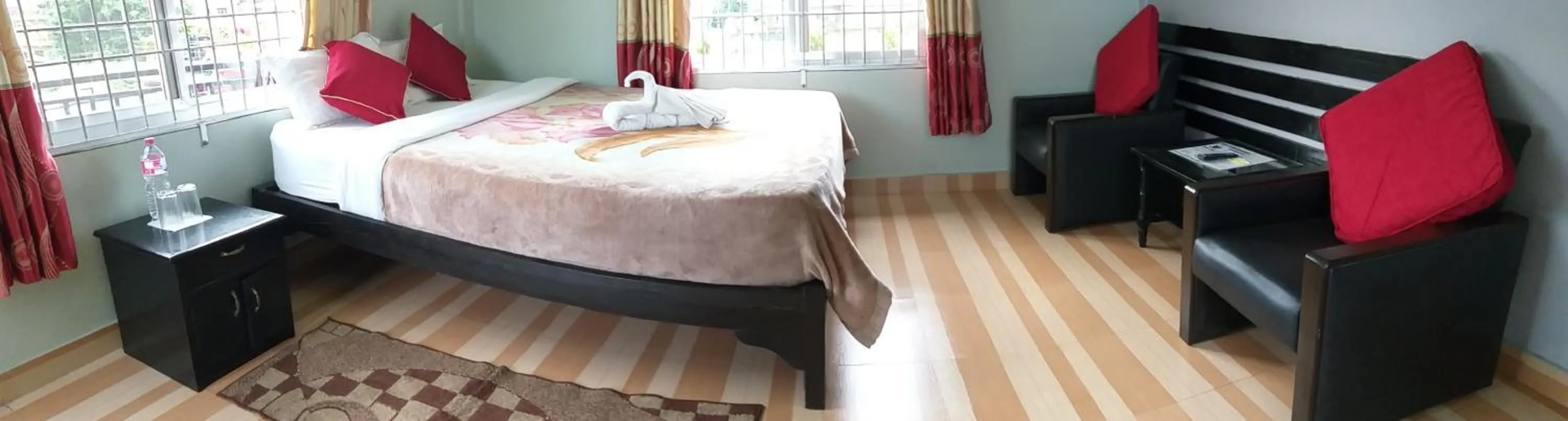 Bed in Harvest Moon Guest House