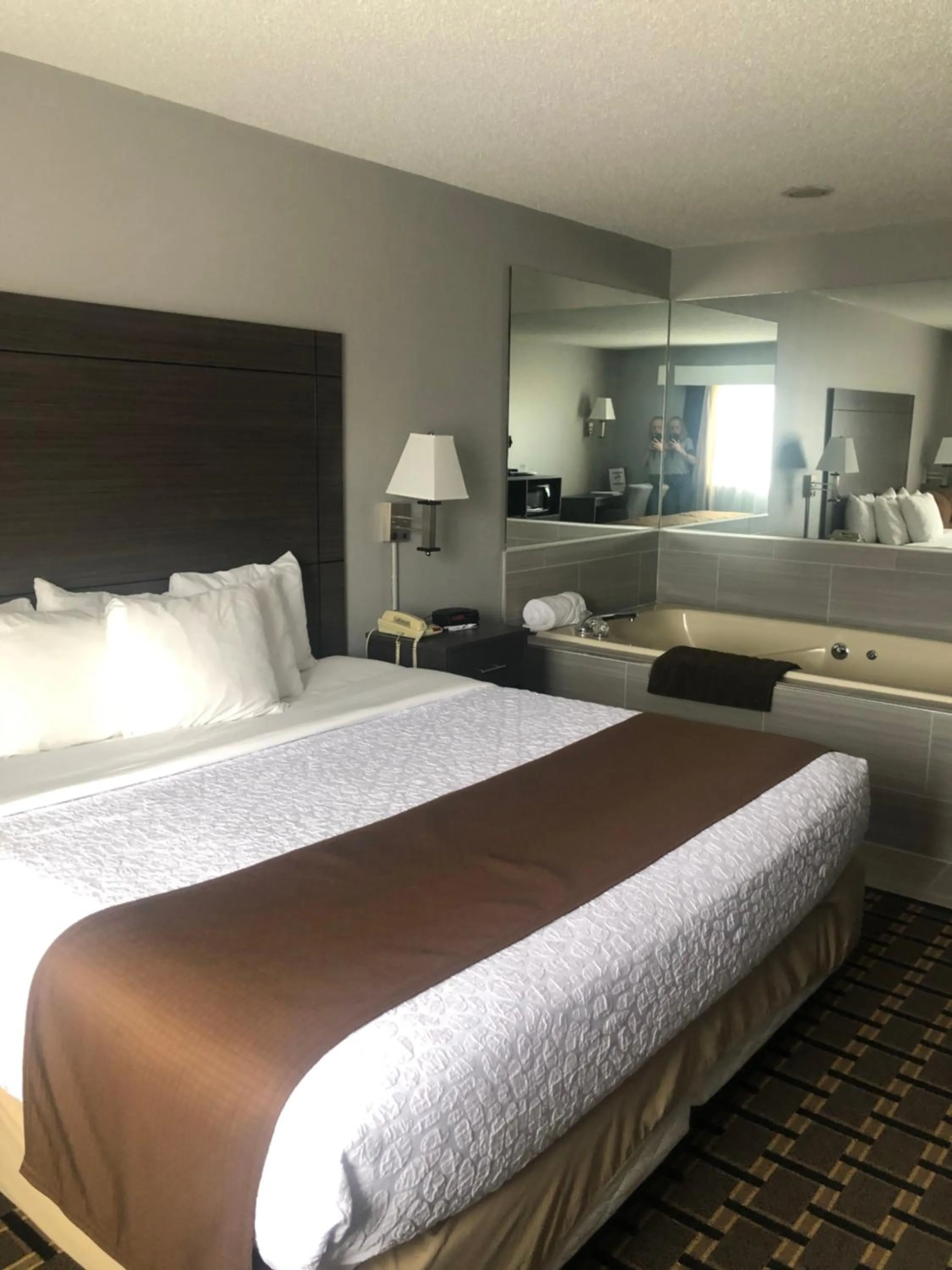 Bed in Adams Inn and Suites