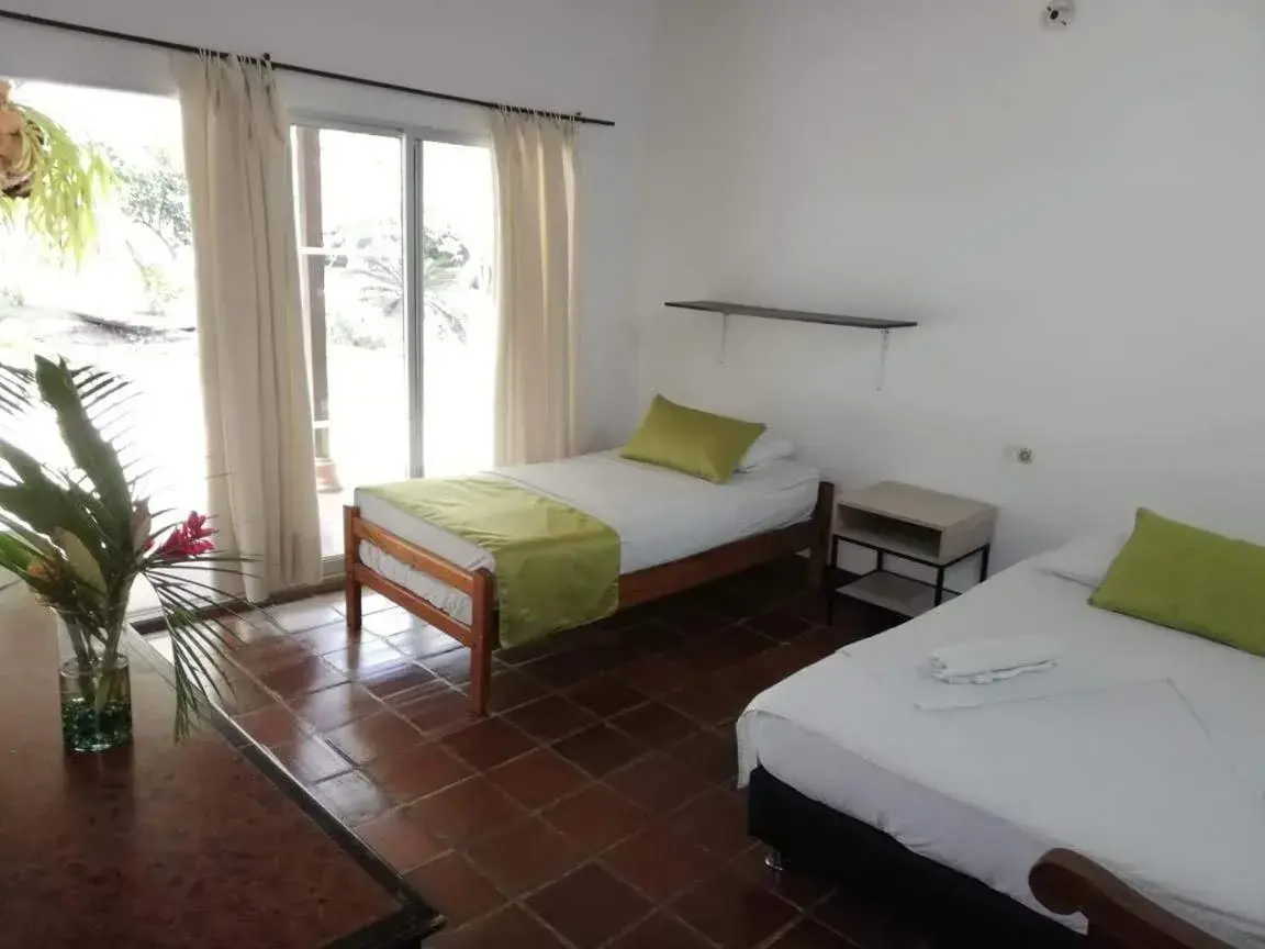 Triple Room in Finca Hotel La Estancia Santa Fe Triple Room in Finca Hotel La Estancia Santa Fe