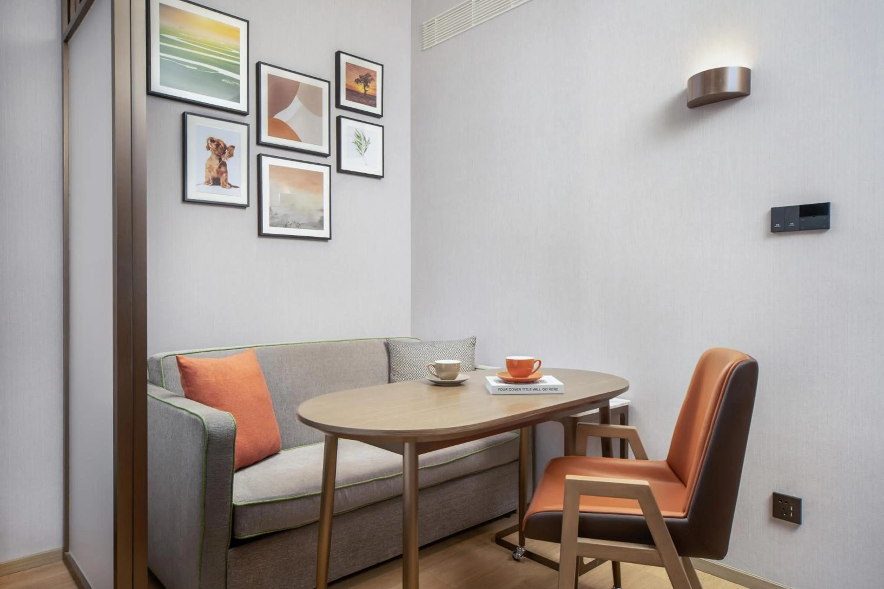 Seating area in Home2 by Hilton Xinjiang Kuche