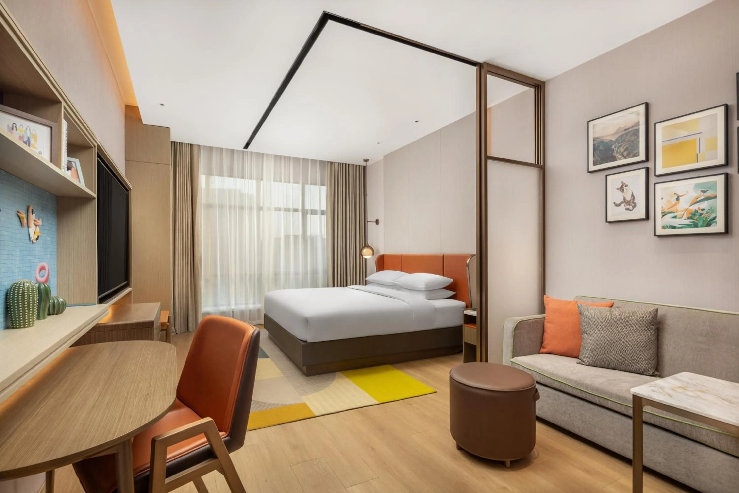 Photo of the whole room in Home2 by Hilton Xinjiang Kuche