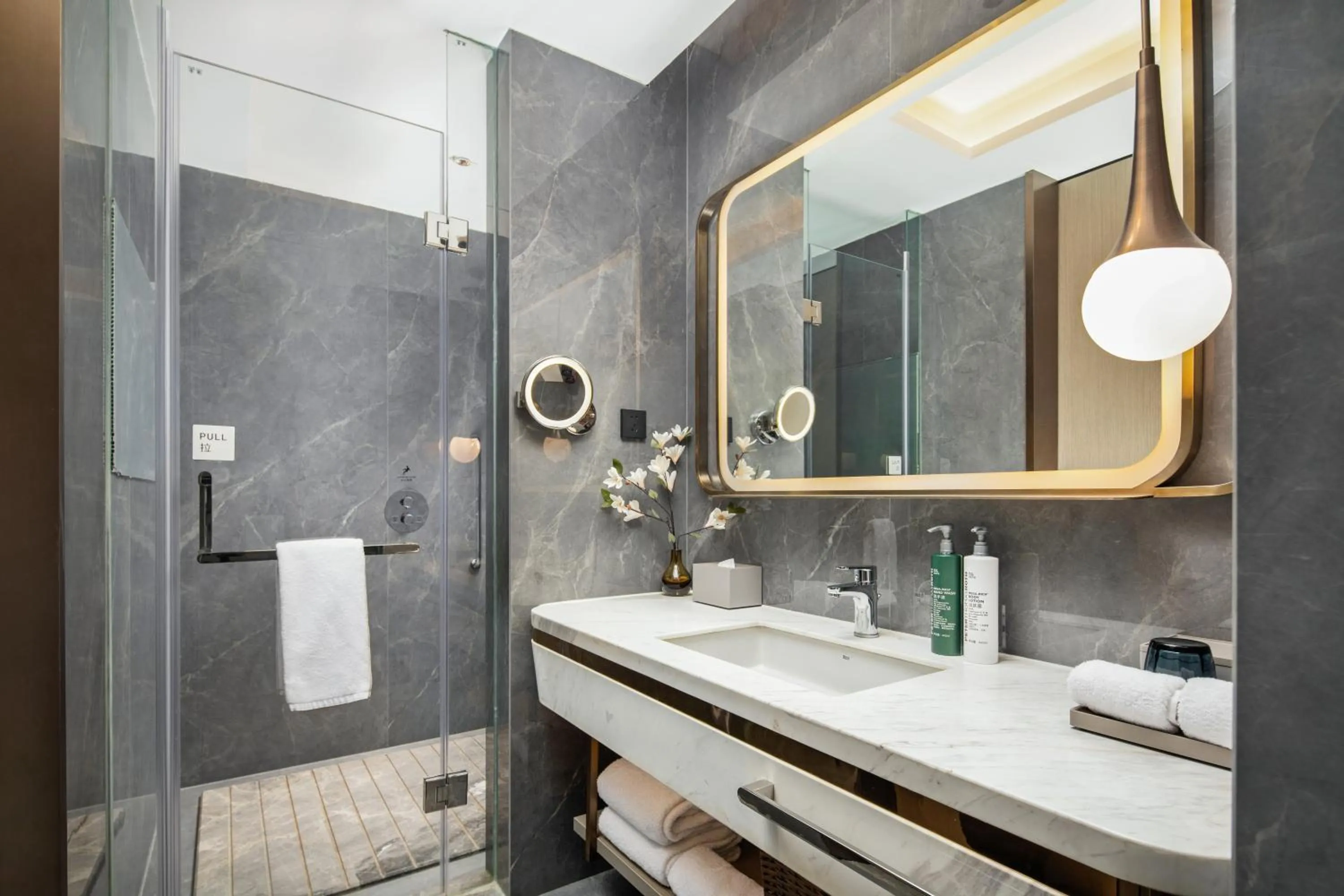 Shower in Home2 by Hilton Xinjiang Kuche