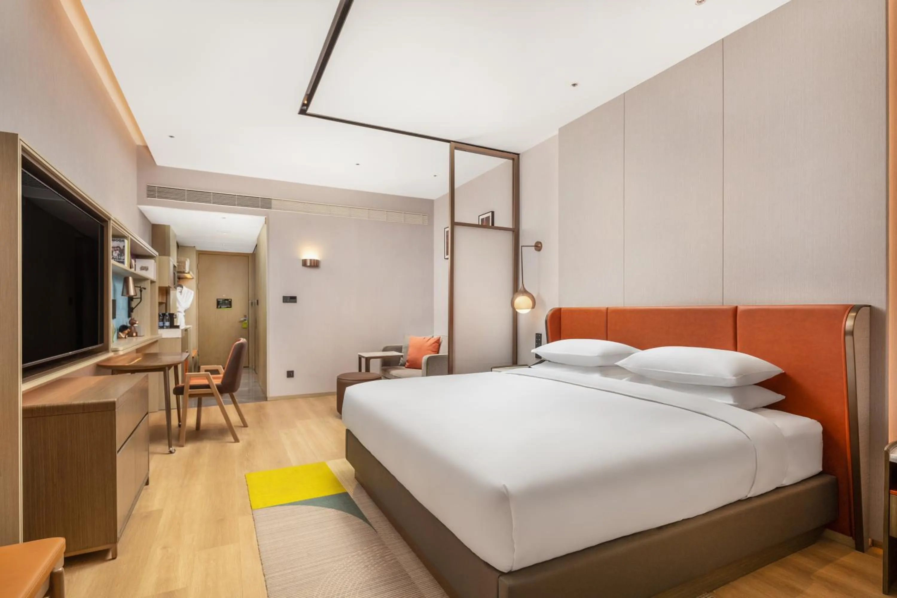 Photo of the whole room in Home2 by Hilton Xinjiang Kuche