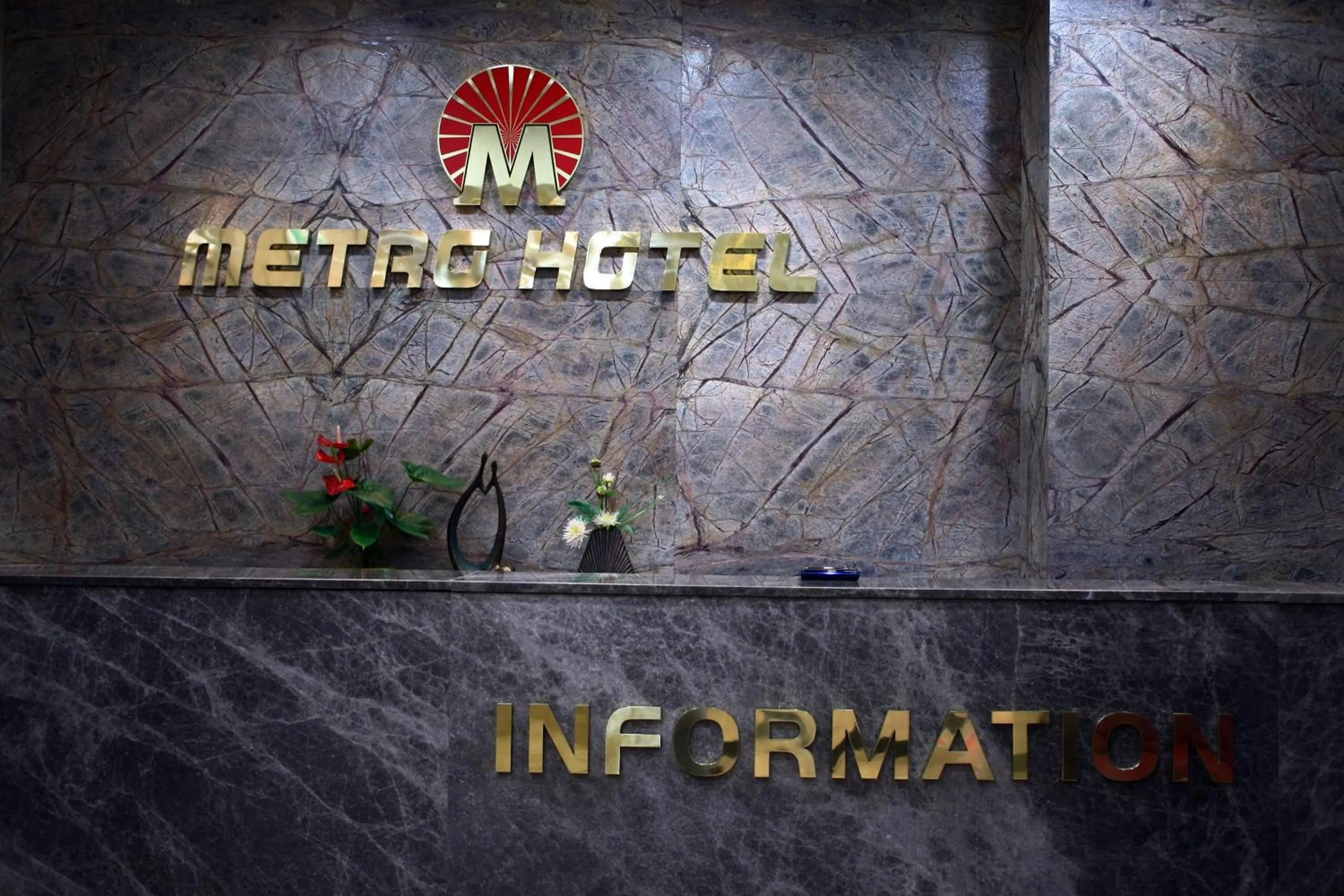 Property logo or sign in Metro Pol Tourist Hotel