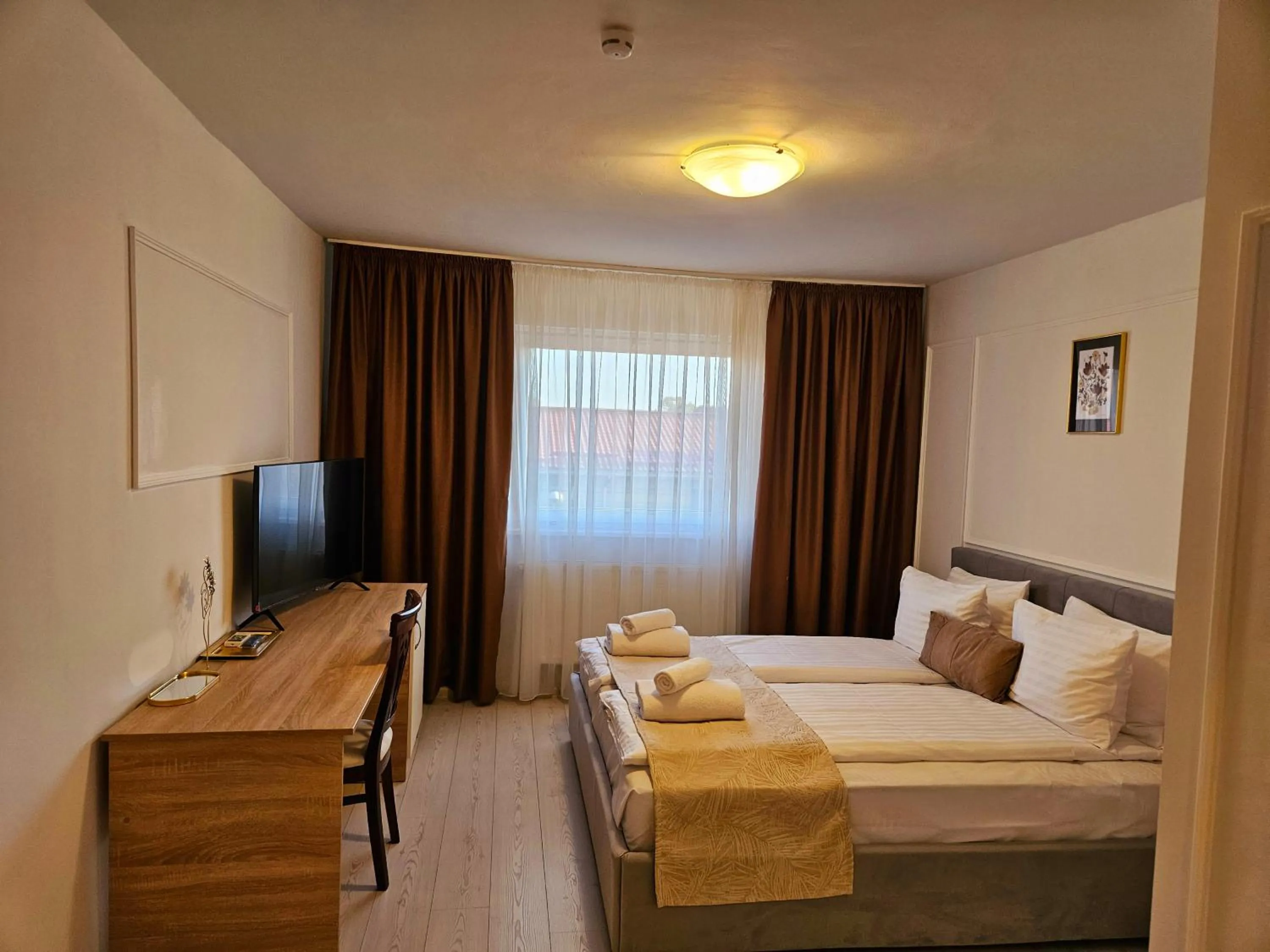 Bed in Hotel Royal Plaza By TimHotels