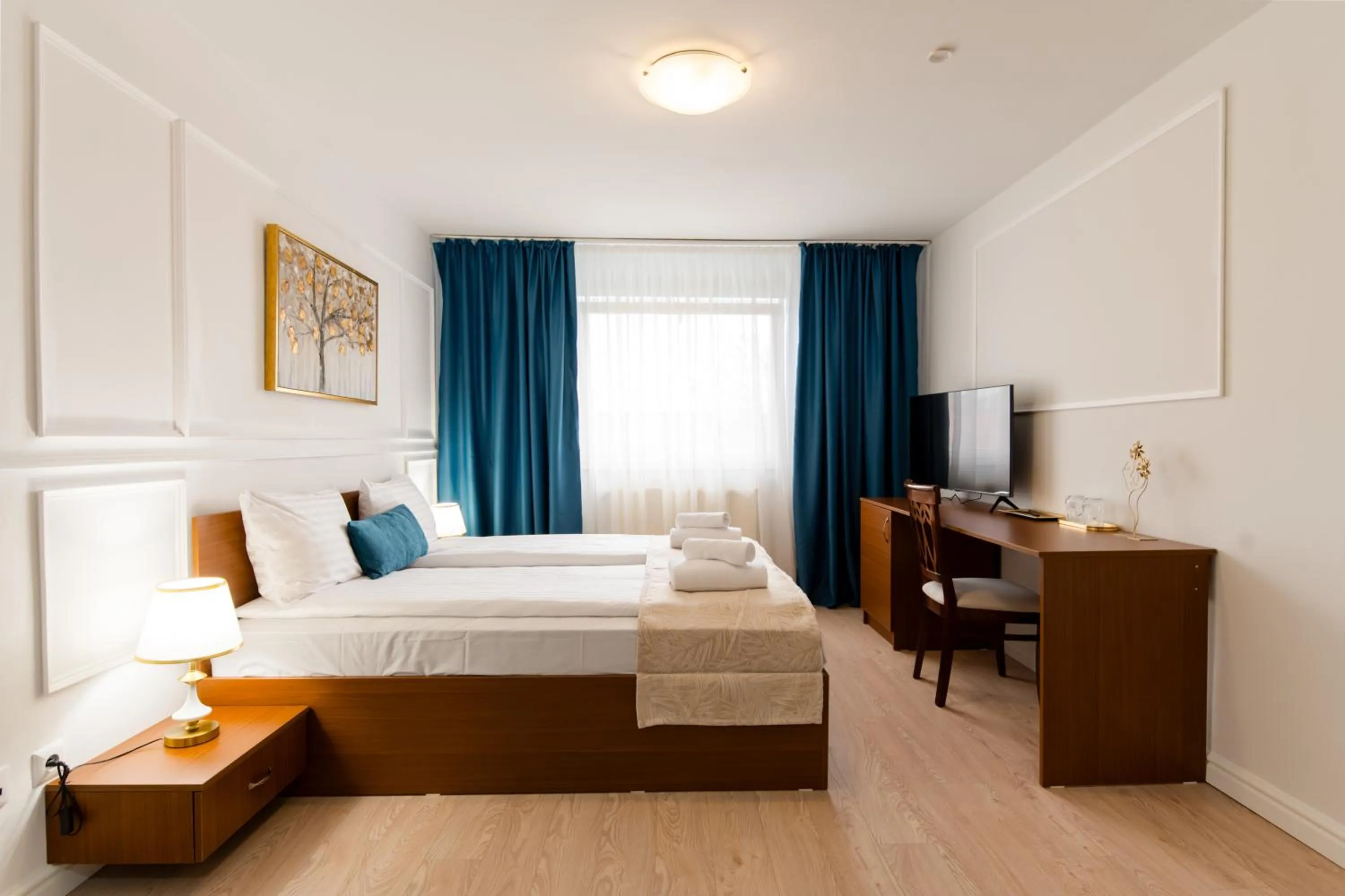 Decorative detail, Bed in Hotel Royal Plaza By TimHotels