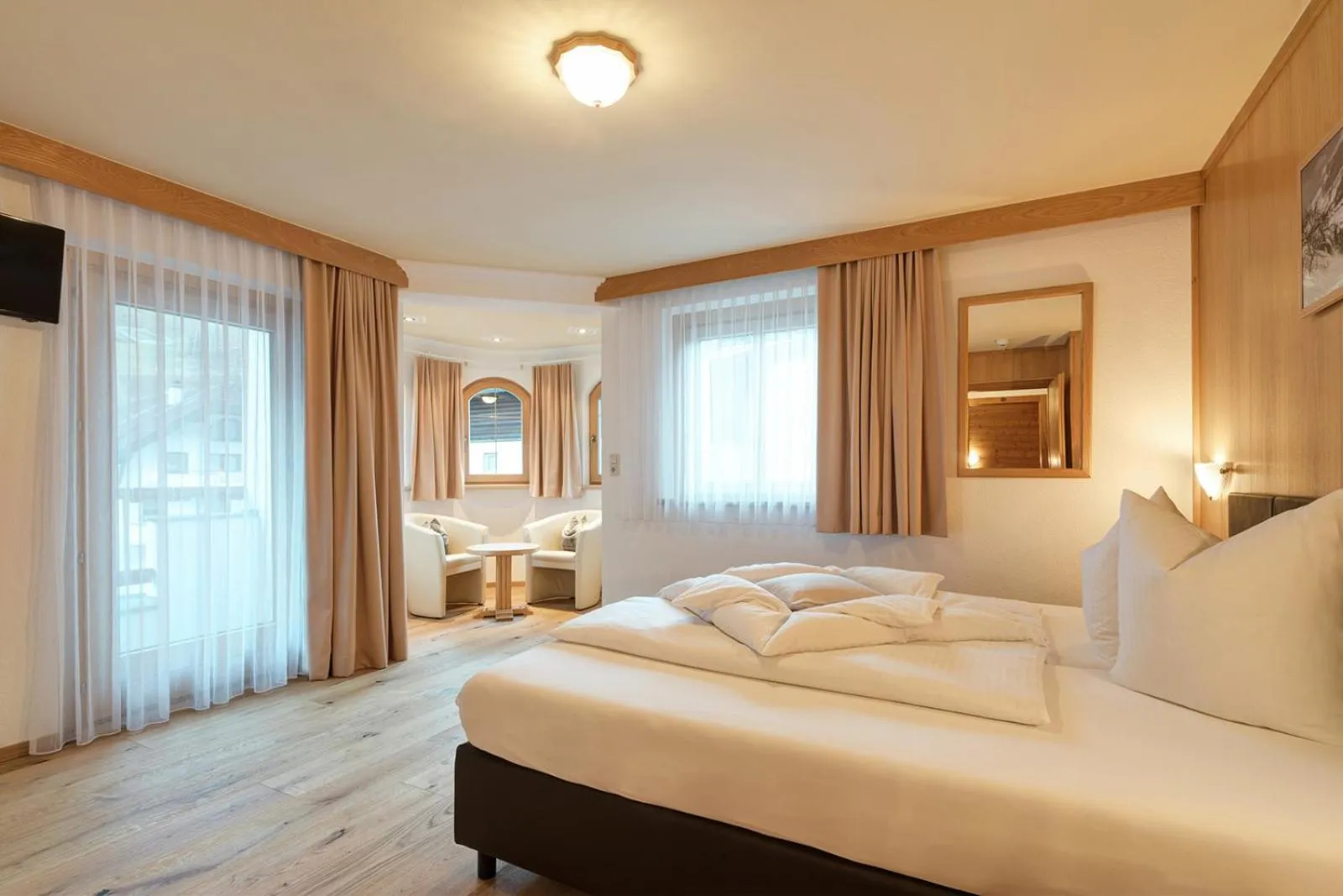 Photo of the whole room, Bed in Hotel Enzian Paznaun