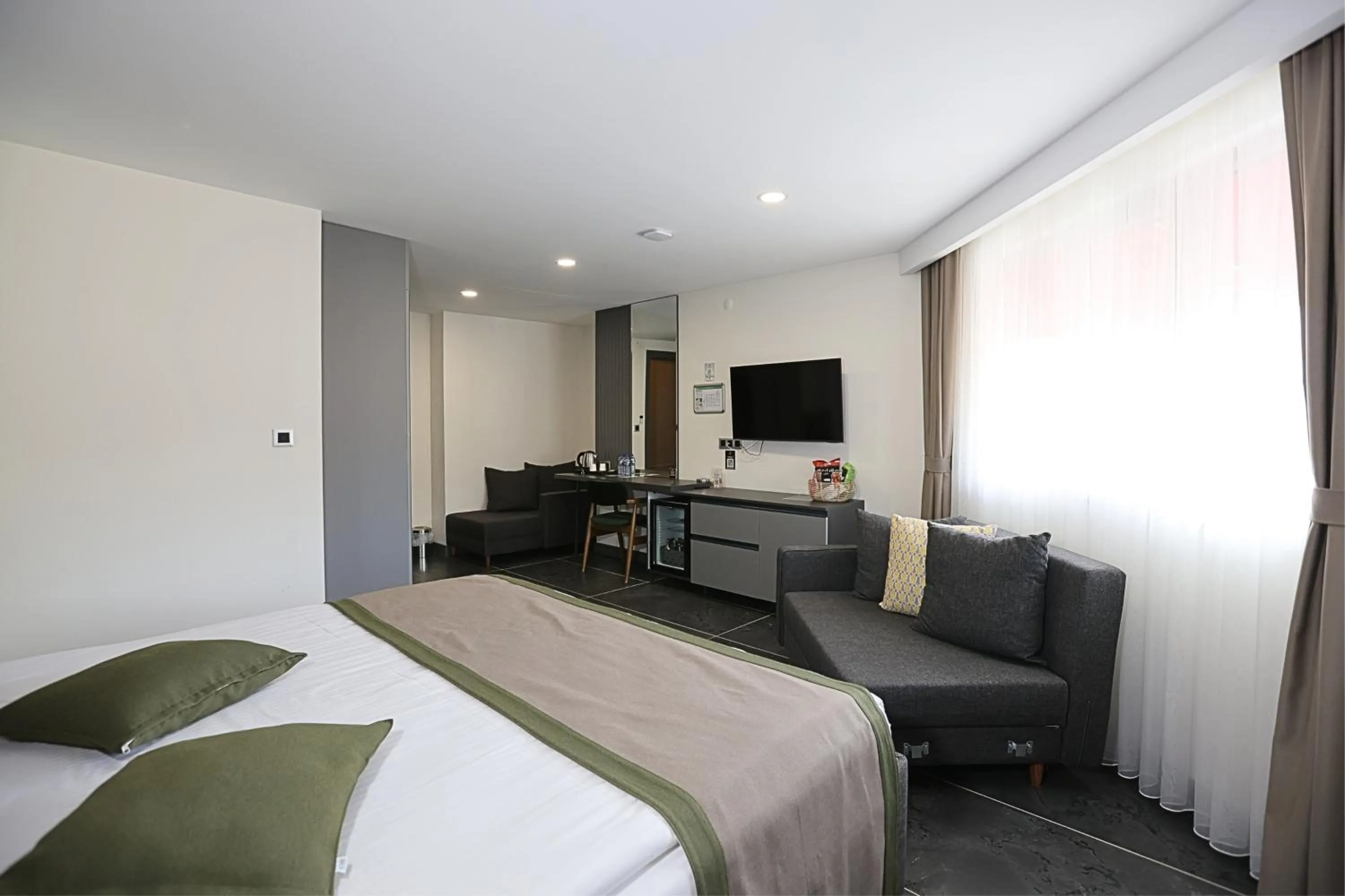 Bed in Ren Business Hotel