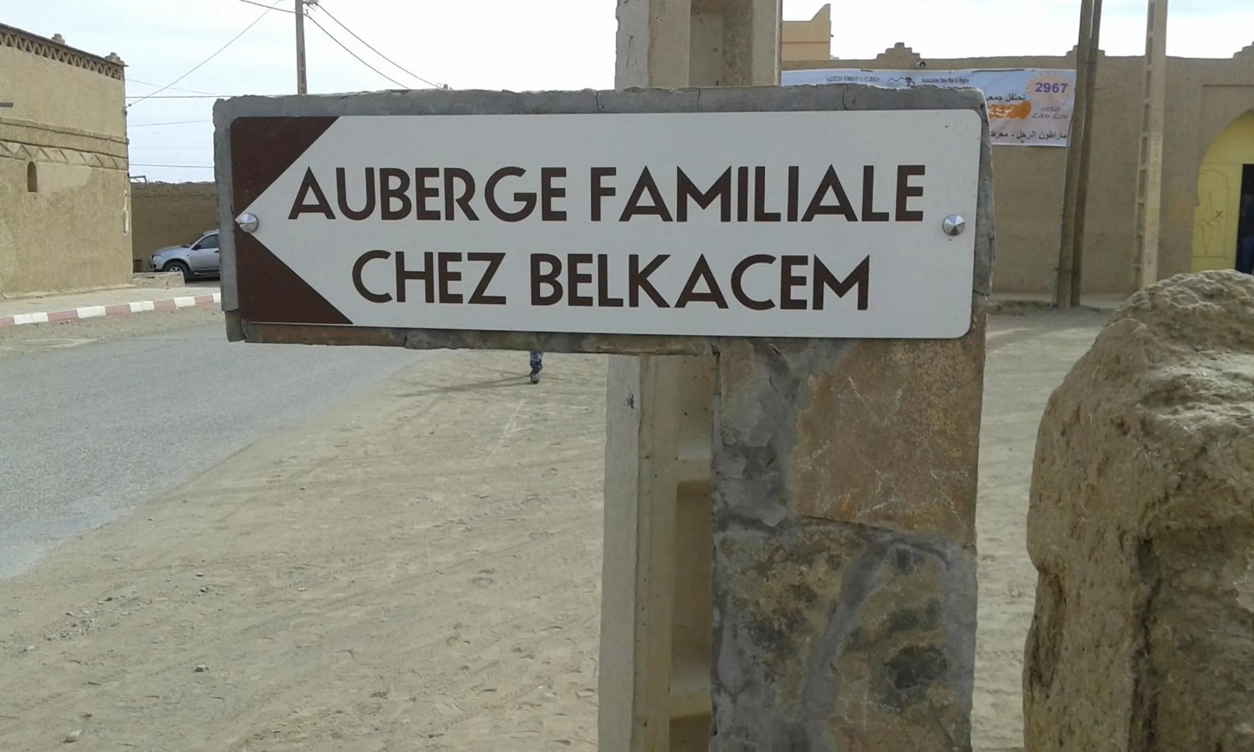 Property logo or sign in Chez Belkacem