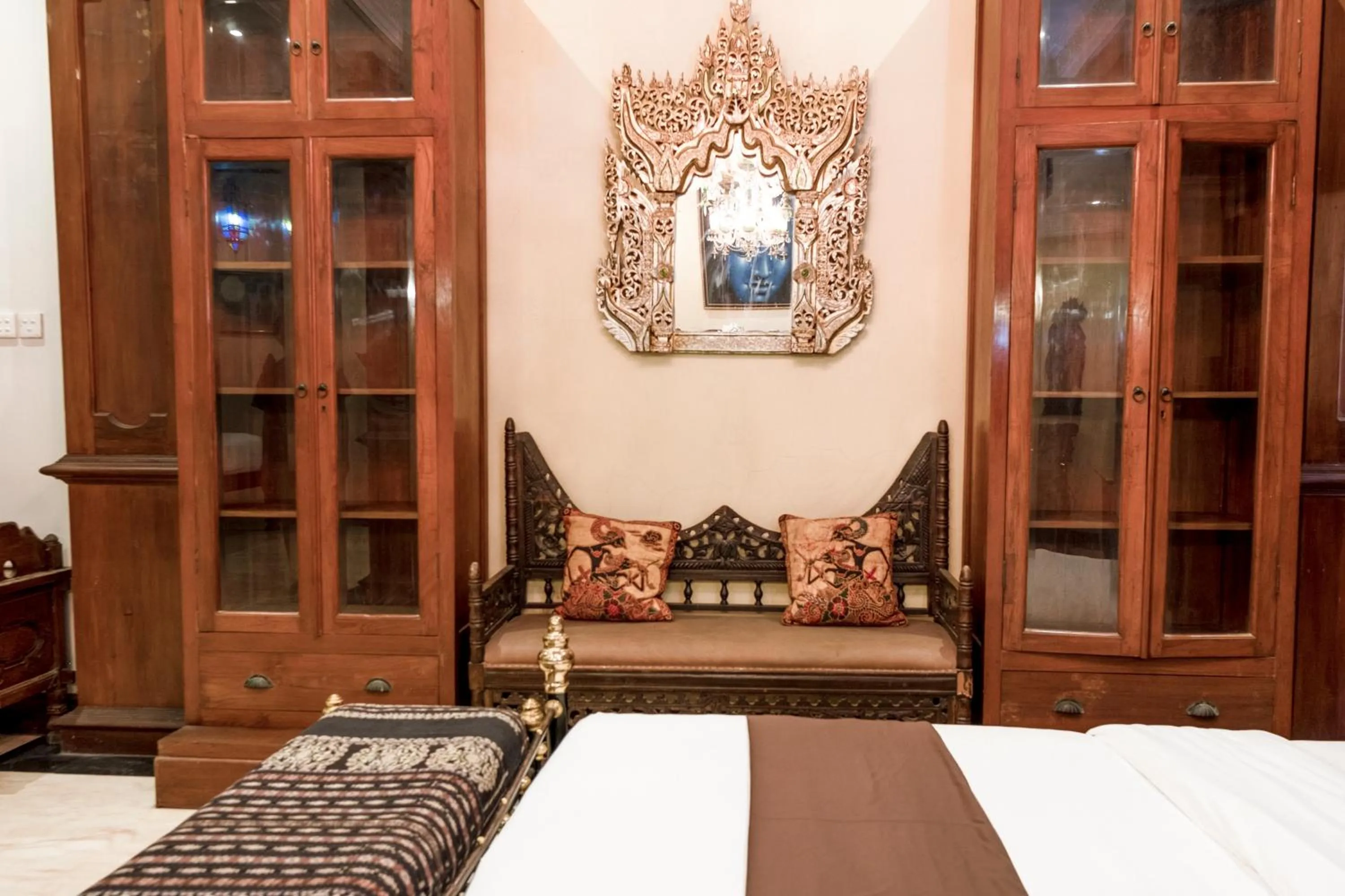 Bed in Rumah Pesik Art & Heritage Hotel