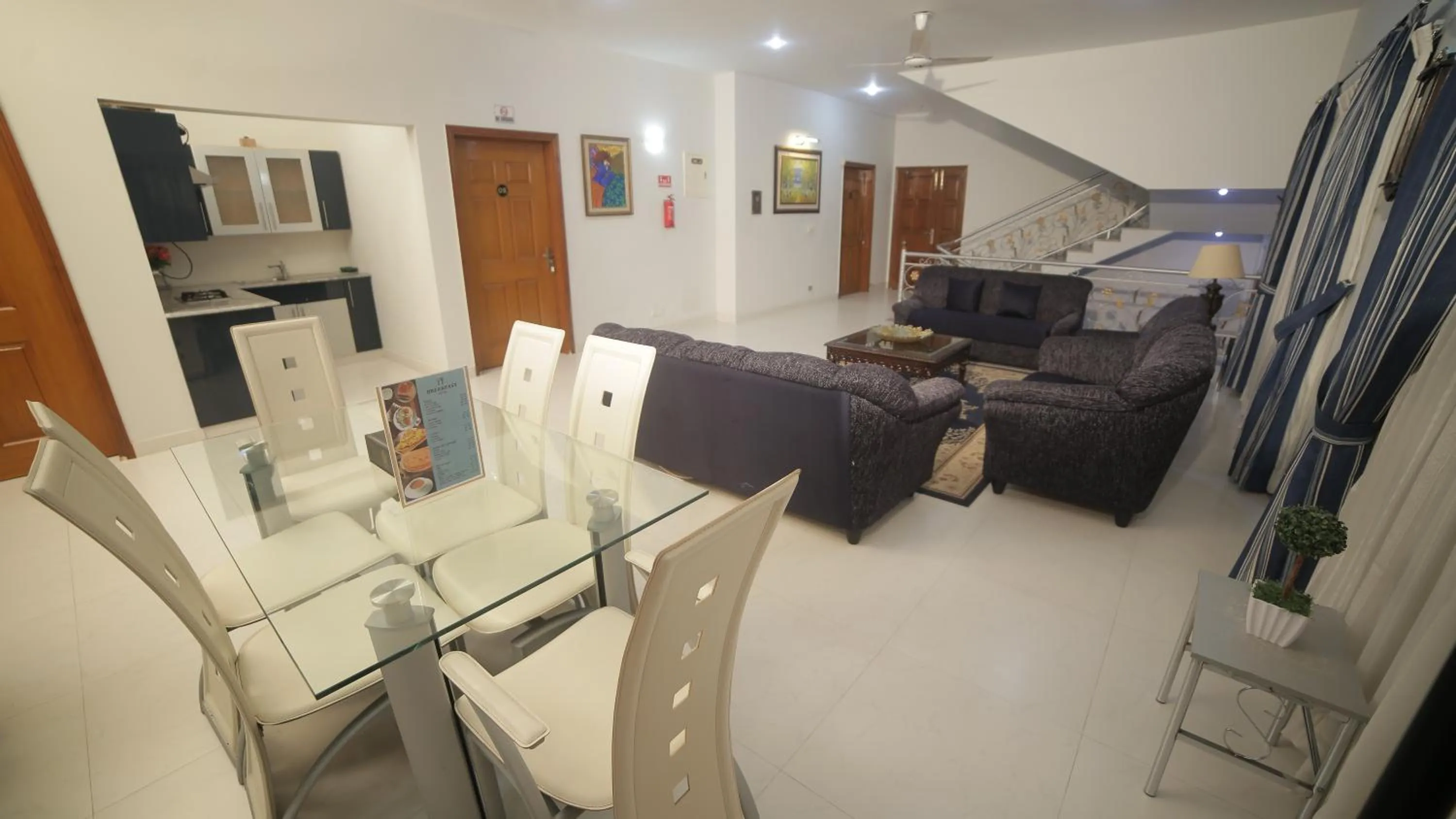 Living room in Four Squares by WI Hotel