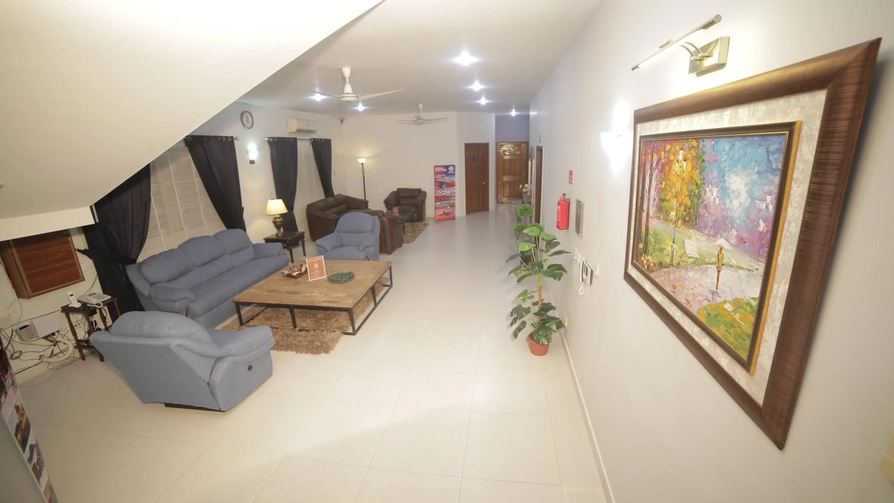 Living room in Four Squares by WI Hotel