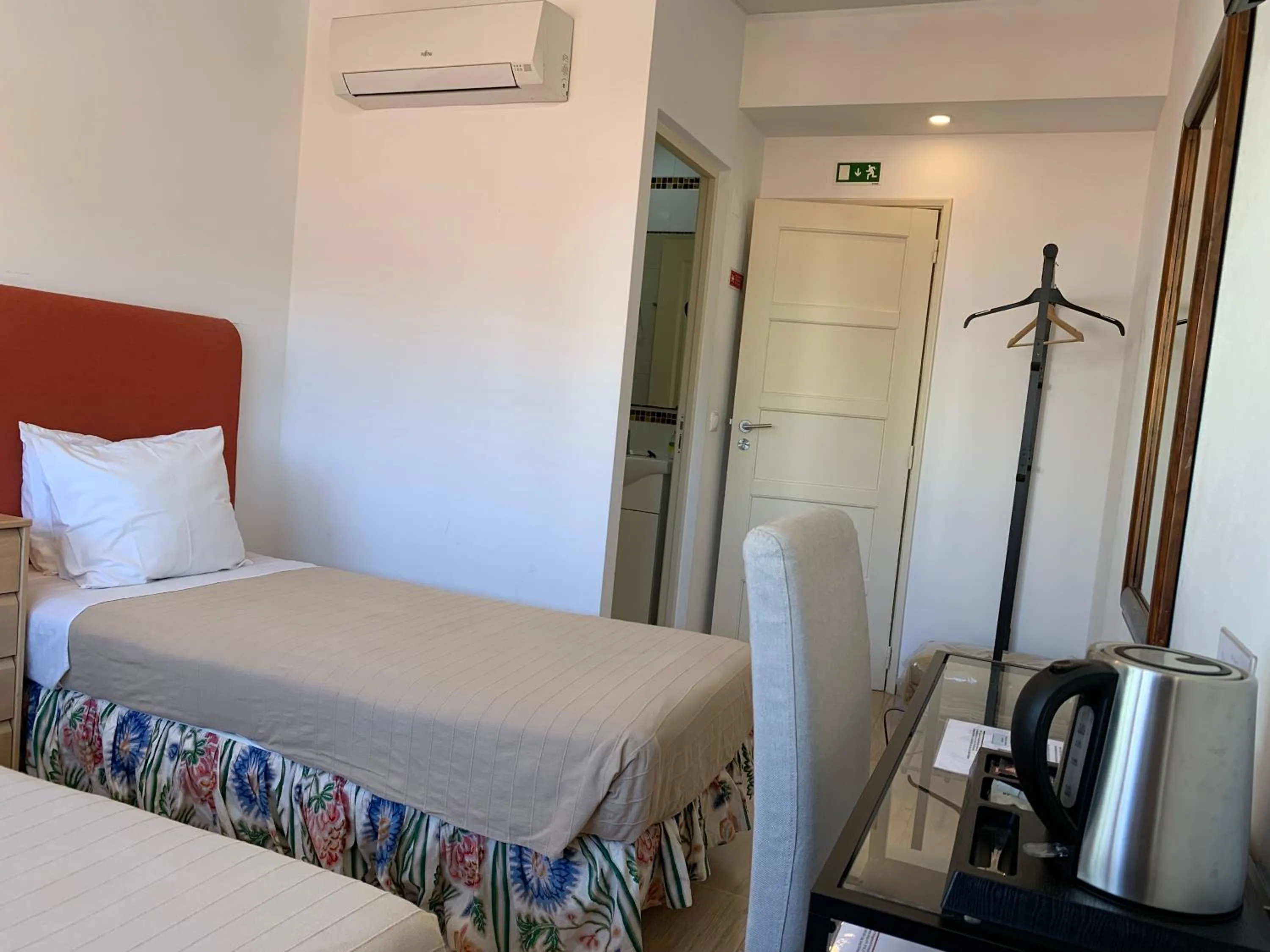 Decorative detail, Bed in Discovery Apartment Expo - Aeroporto