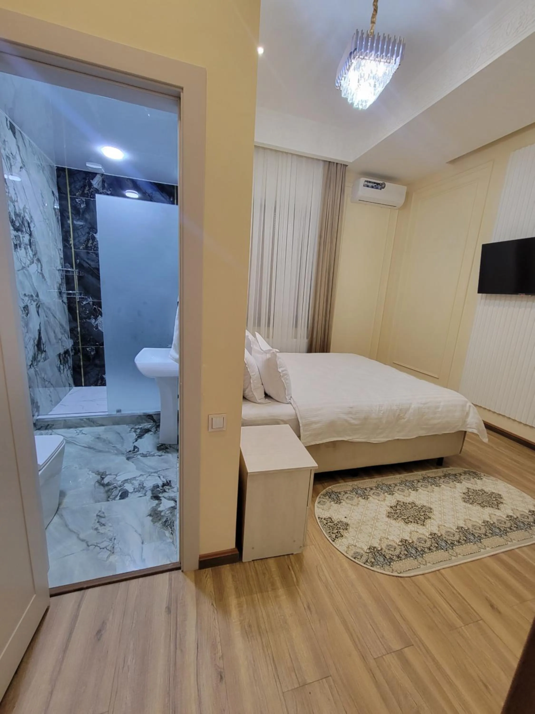Shower, Bed in Old City Samarkand Hotel