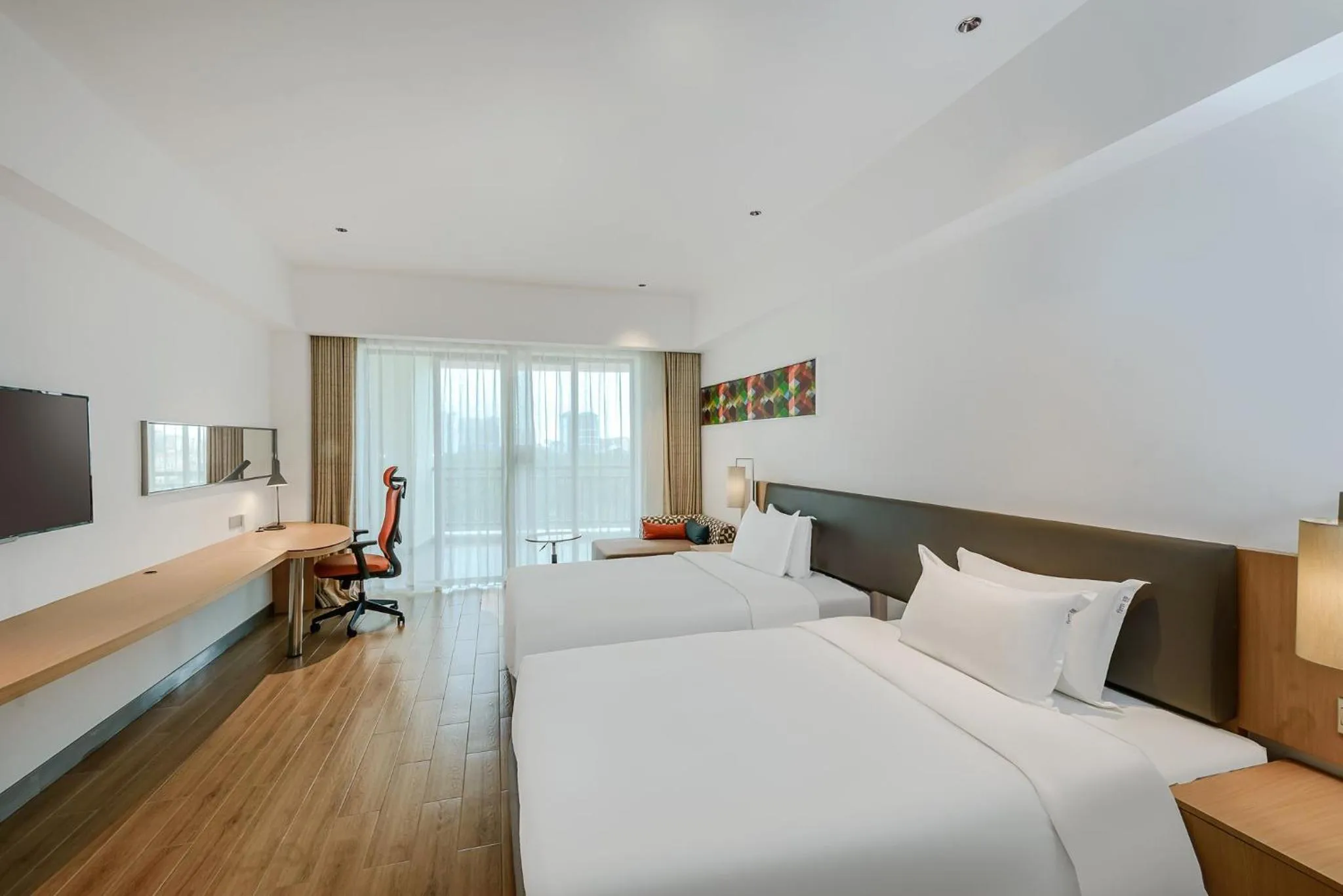 Photo of the whole room, Bed in Holiday Inn Express Haikou West Coast by IHG