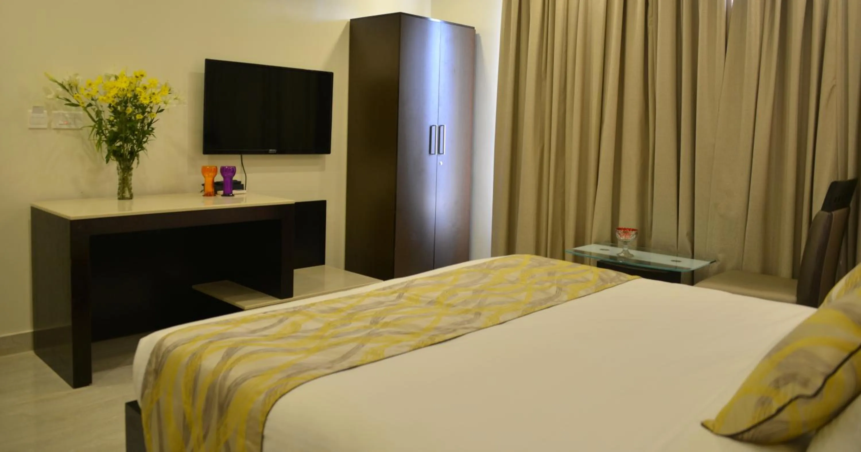 Bed in Orabella Villas & Suites