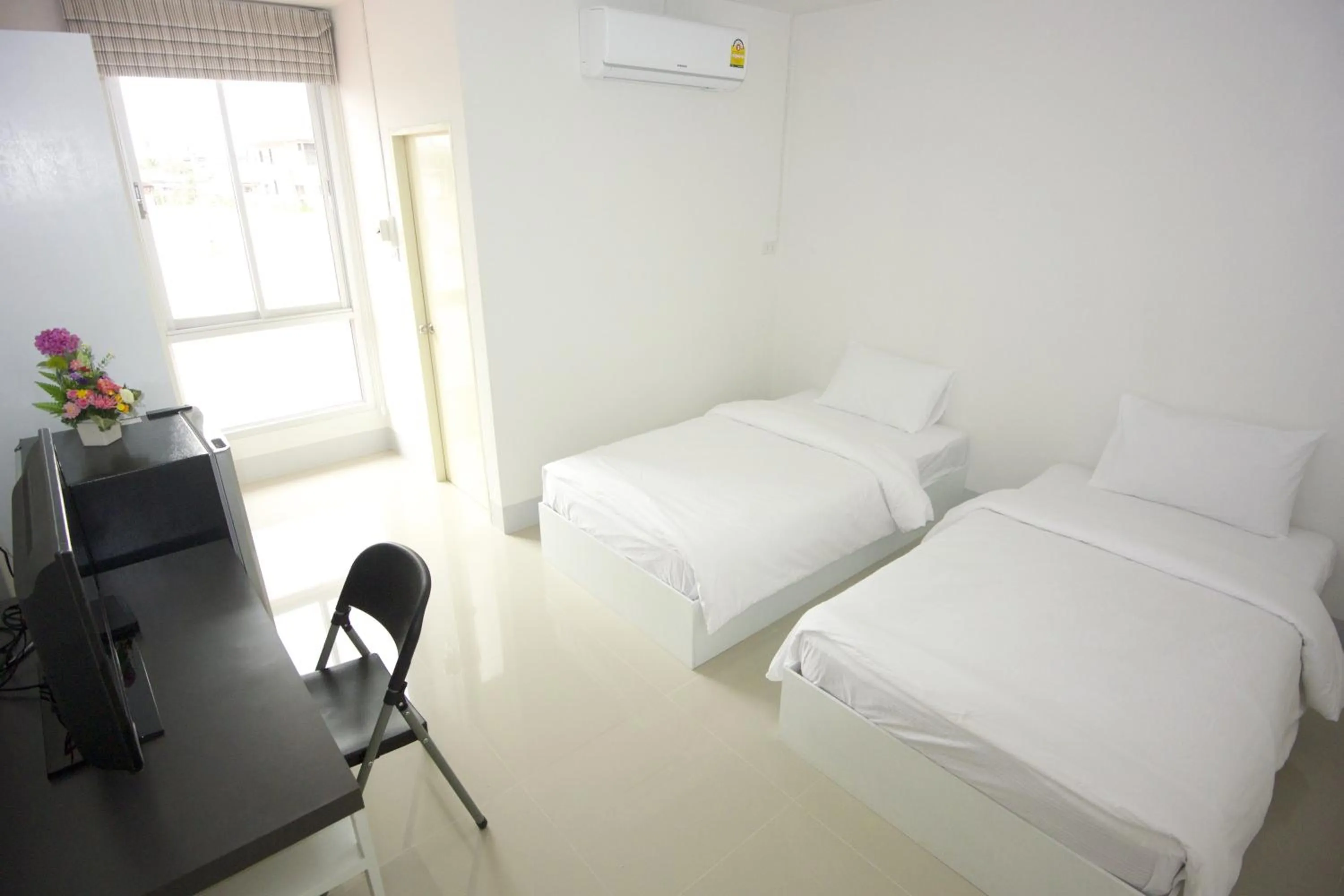 Photo of the whole room, Bed in Honghub Sakon Hotel