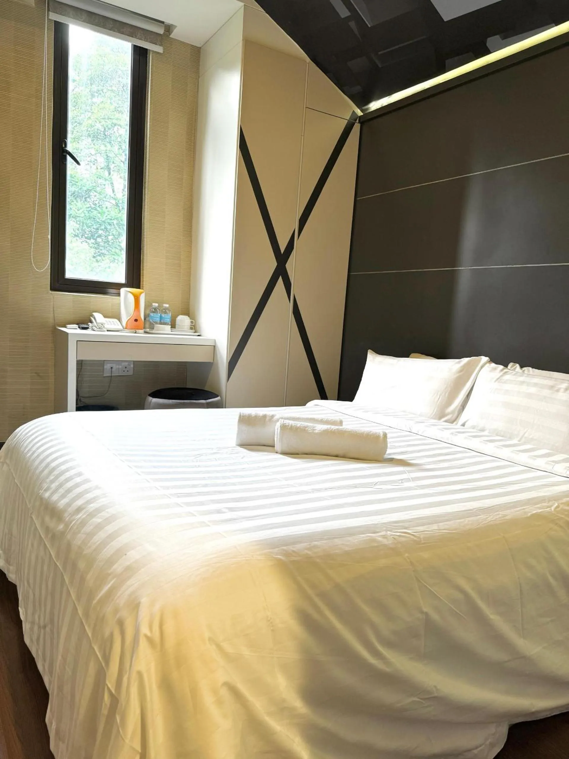 Bed in Chariton Hotel Nusa Bestari