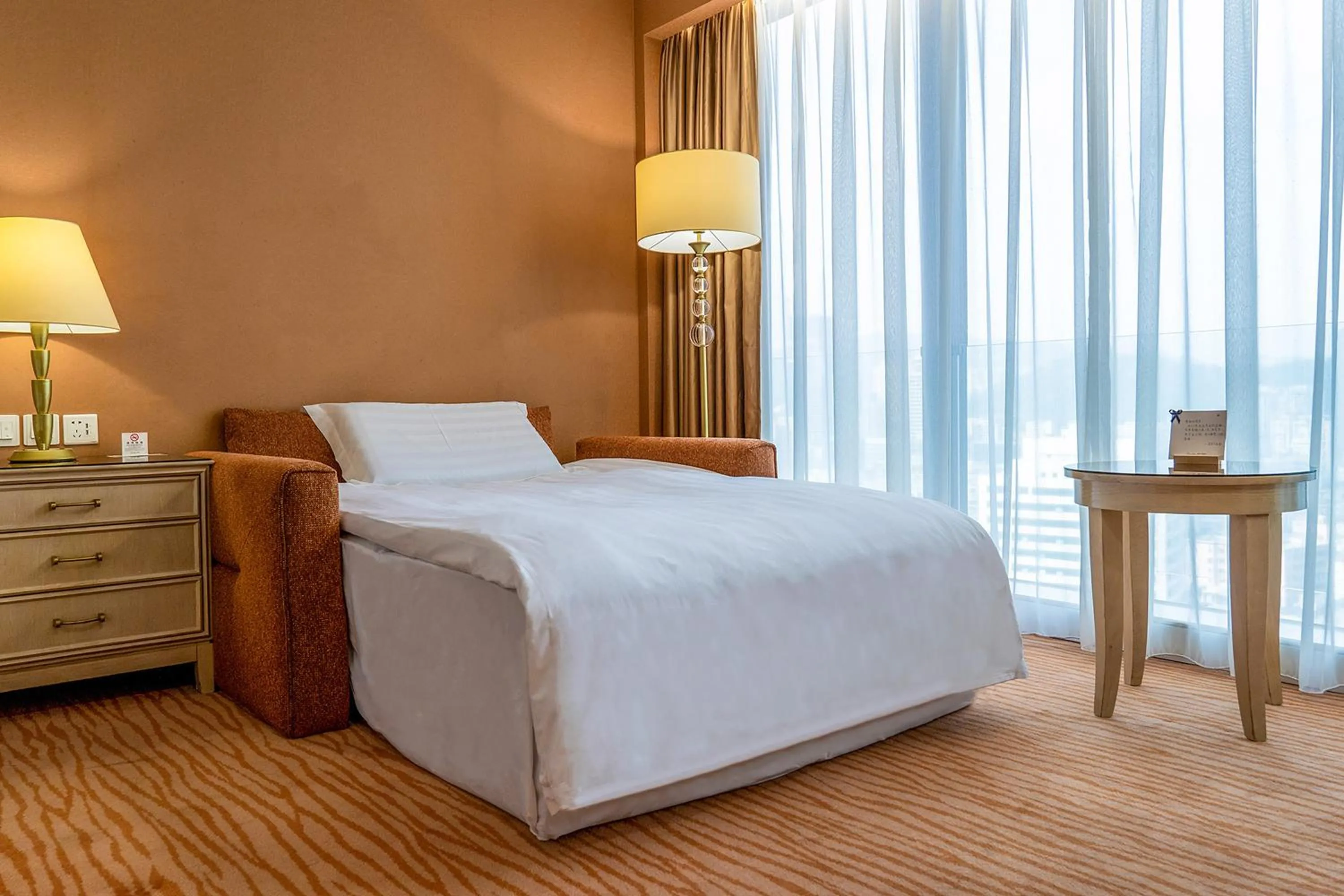 Bed in Similan Hotel Zhuhai-Gongbei Port