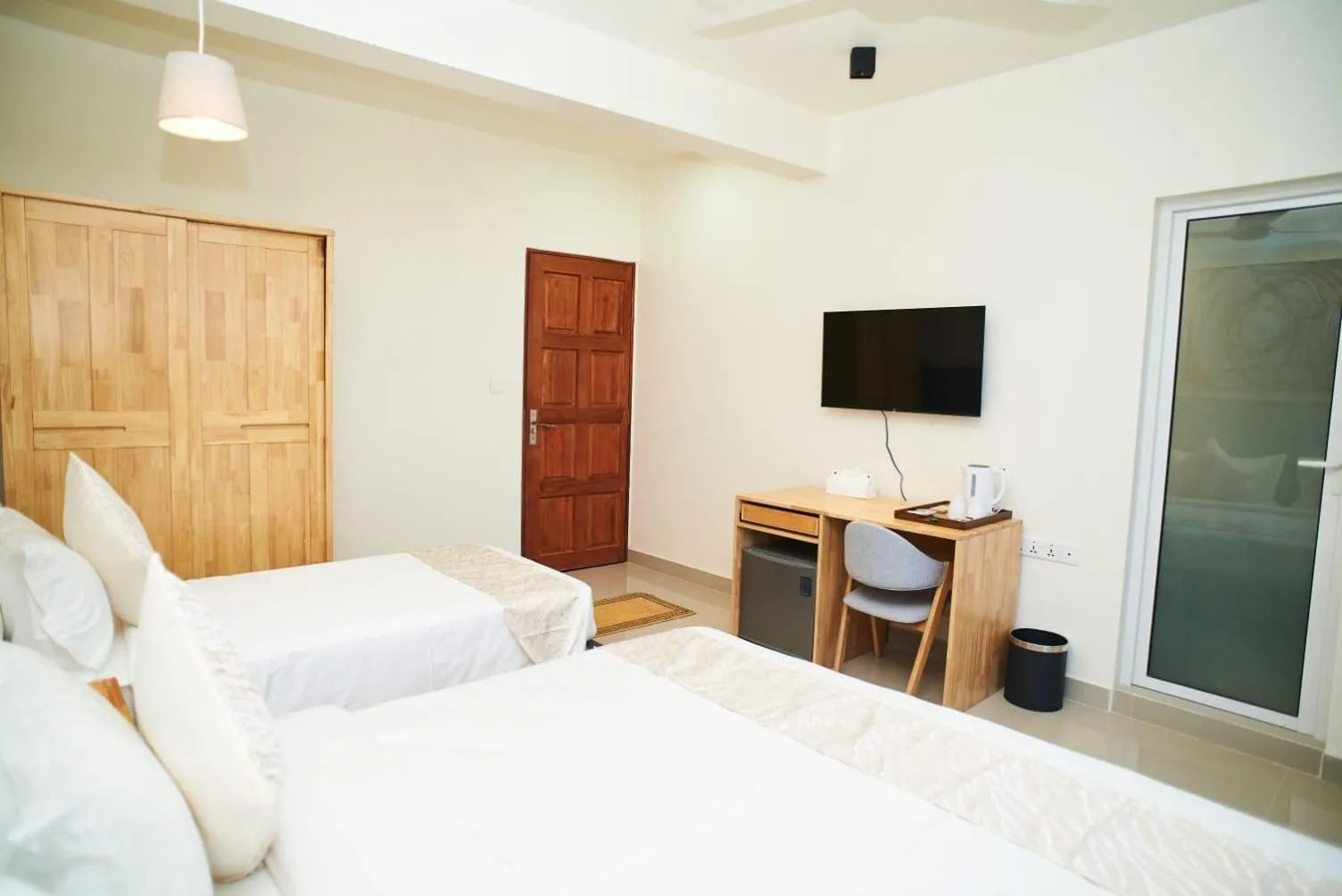 Bed in YUVi Blue Maldives & spa