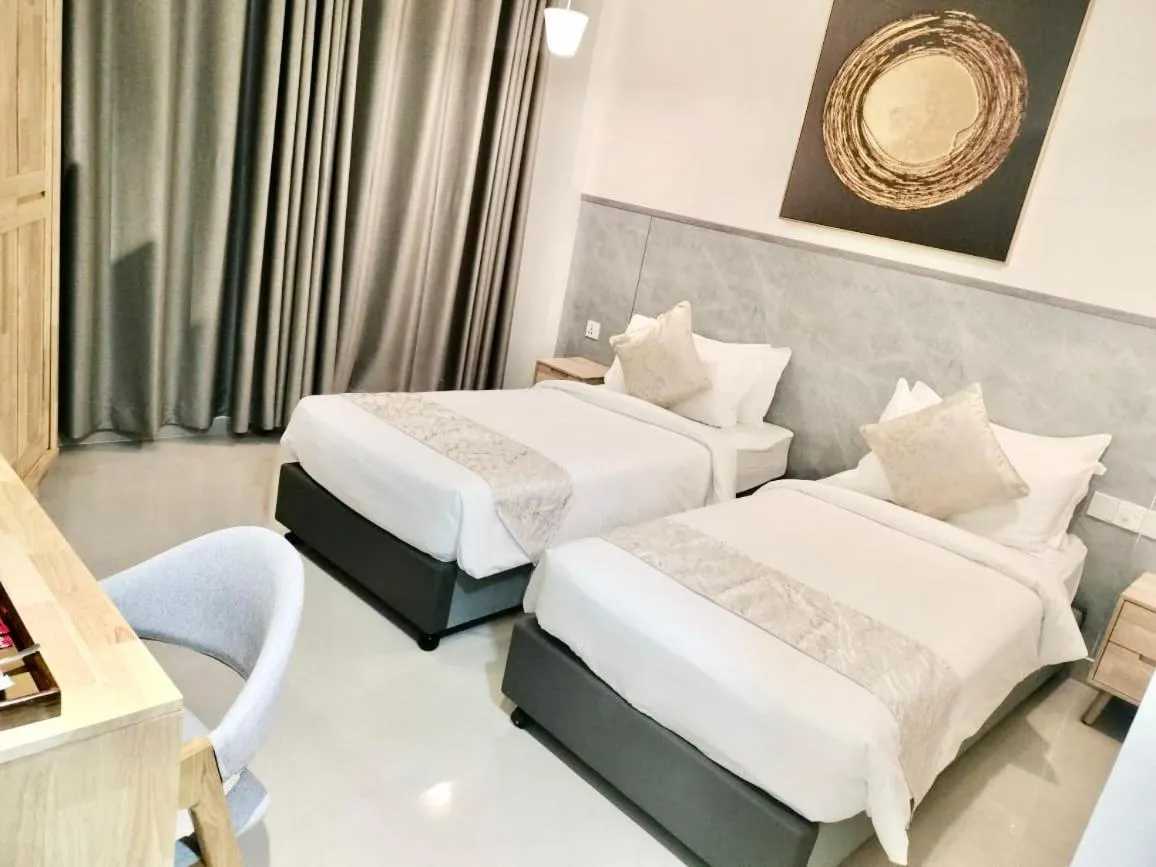 Bed in YUVi Blue Maldives & spa