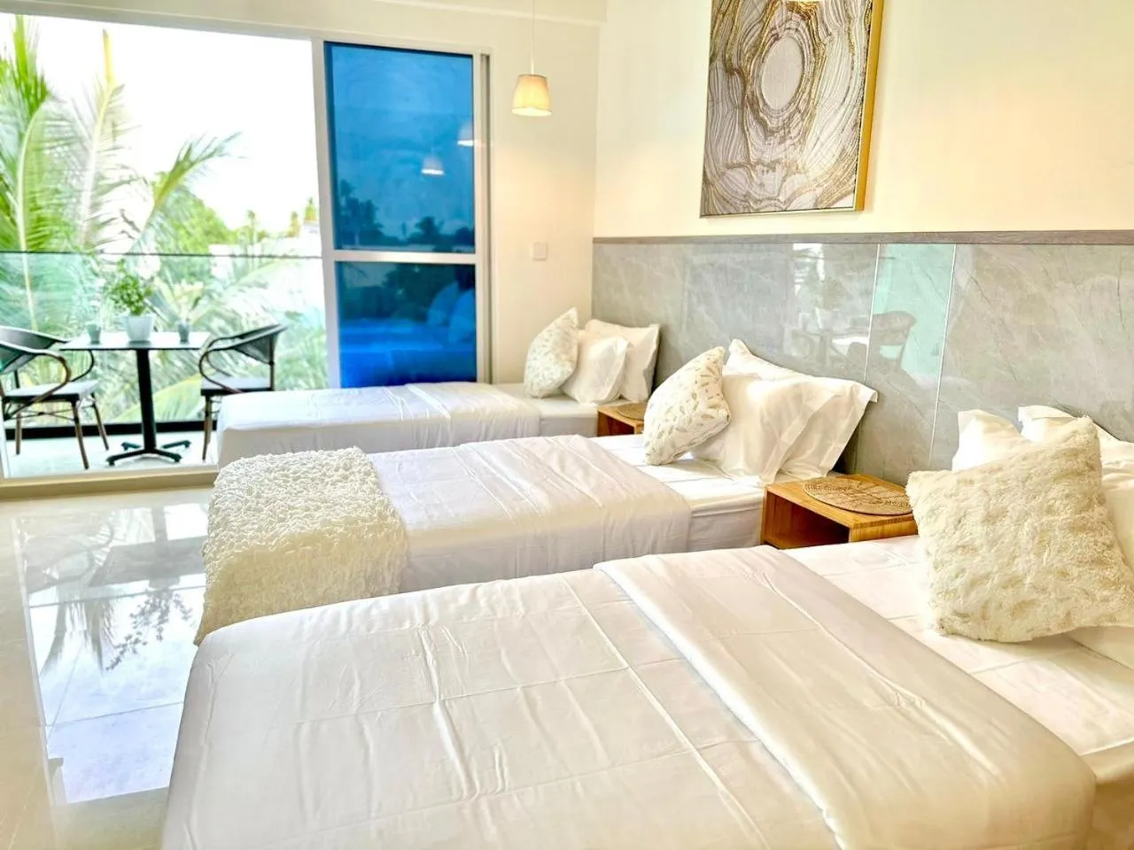 Bed in YUVi Blue Maldives & spa