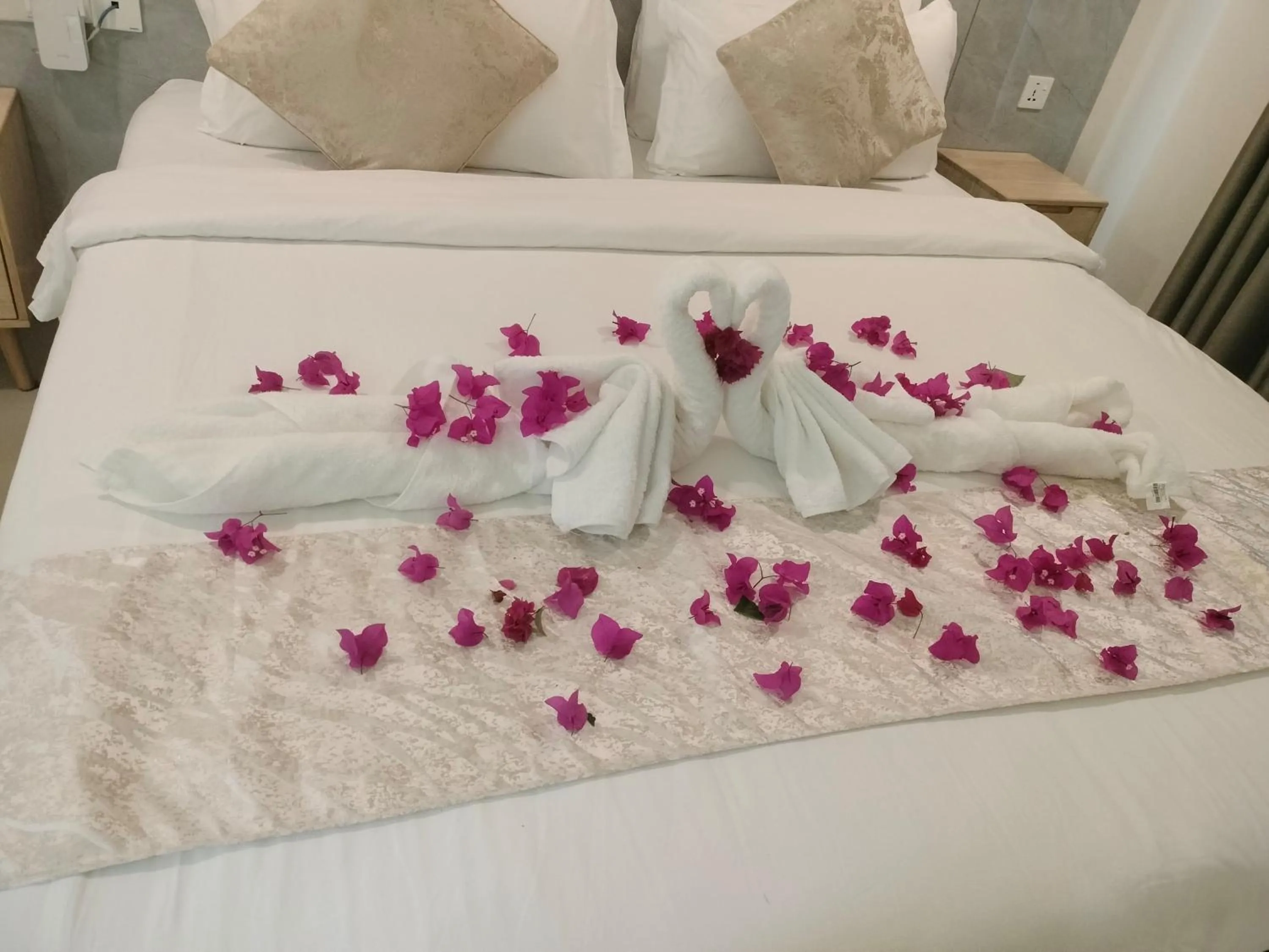 Bed in YUVi Blue Maldives & spa